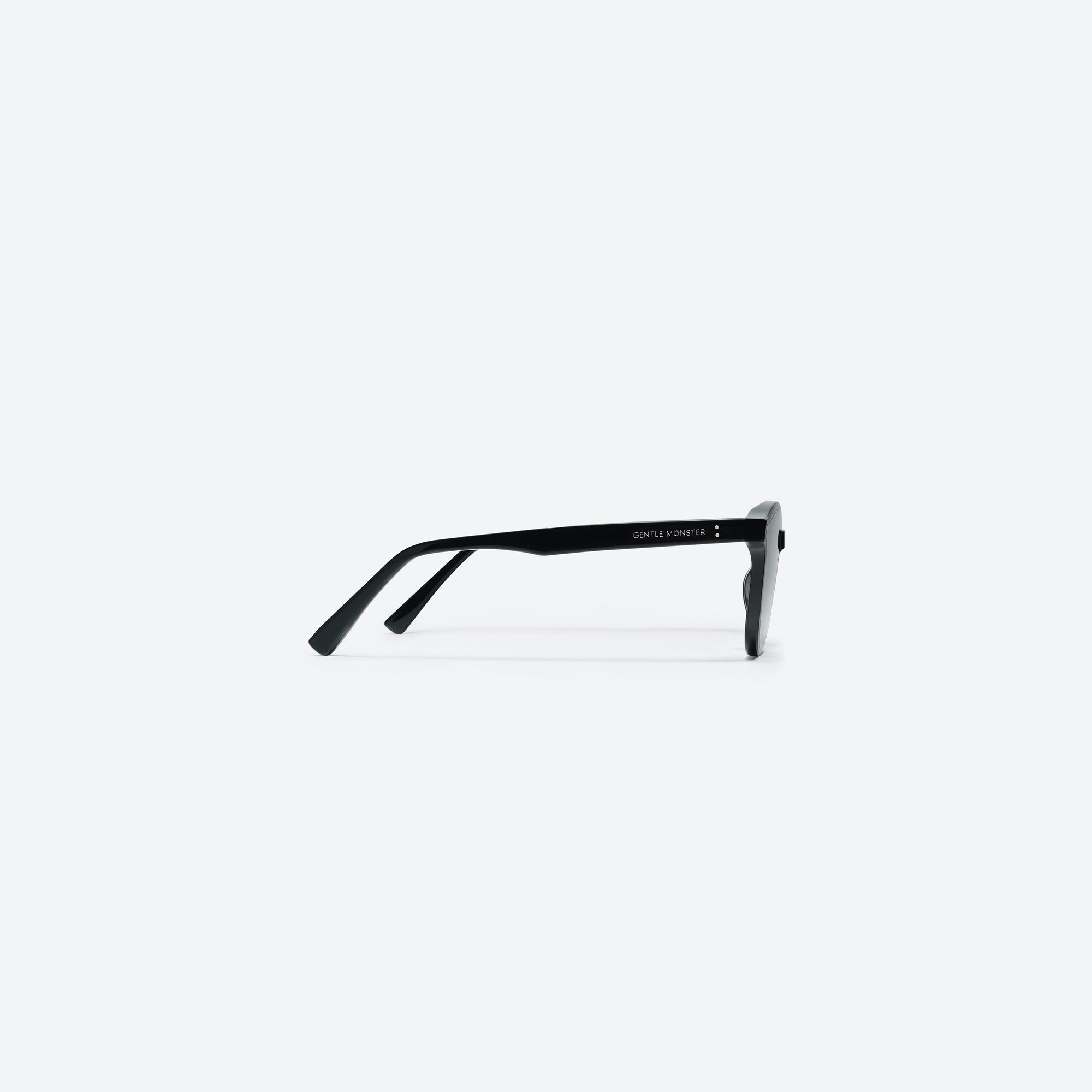 A detailed right view of Gentle Monster Lang 01 Black Acetate framed Round sunglasses.