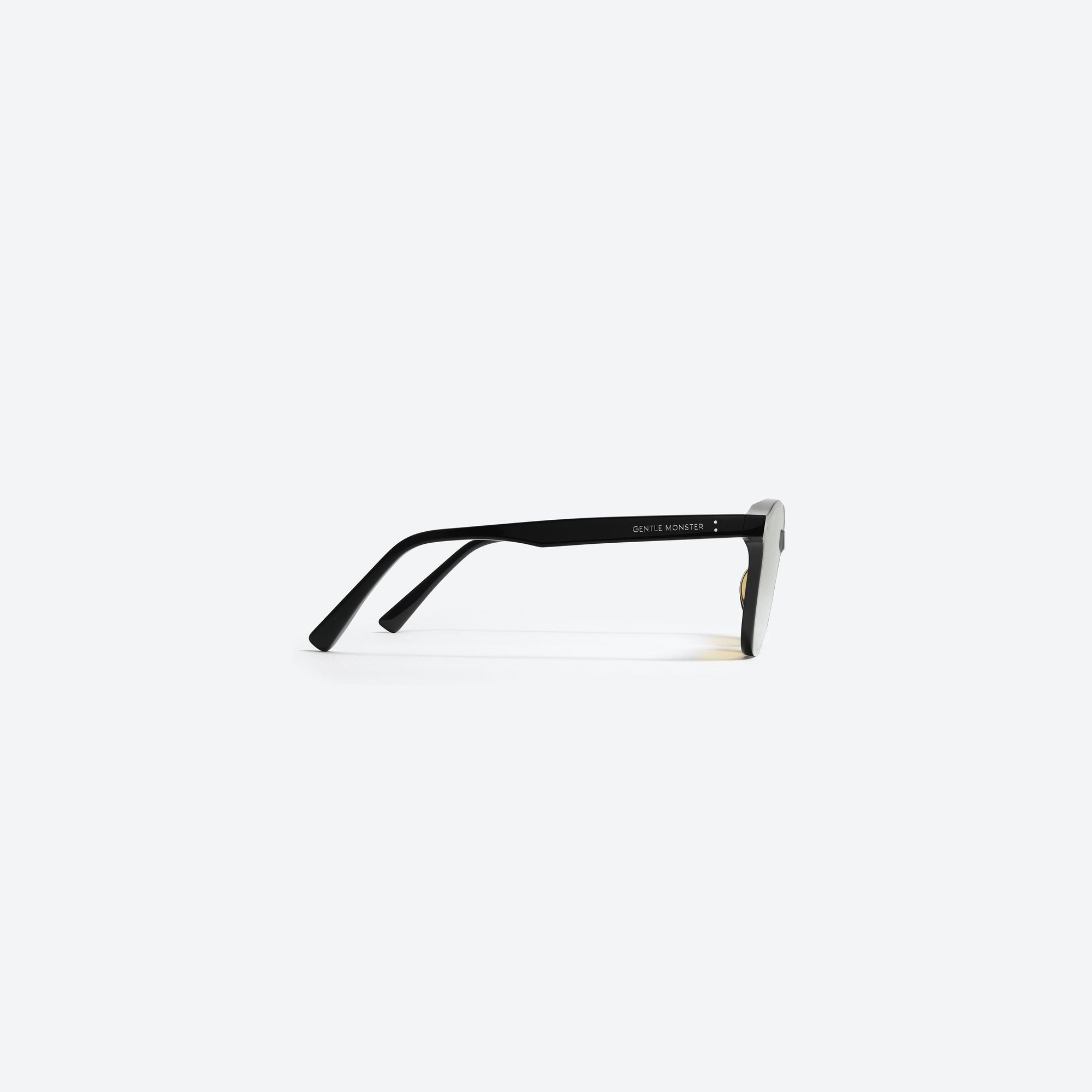A detailed right view of Gentle Monster Lang 01(OR) Black Acetate framed Round sunglasses.