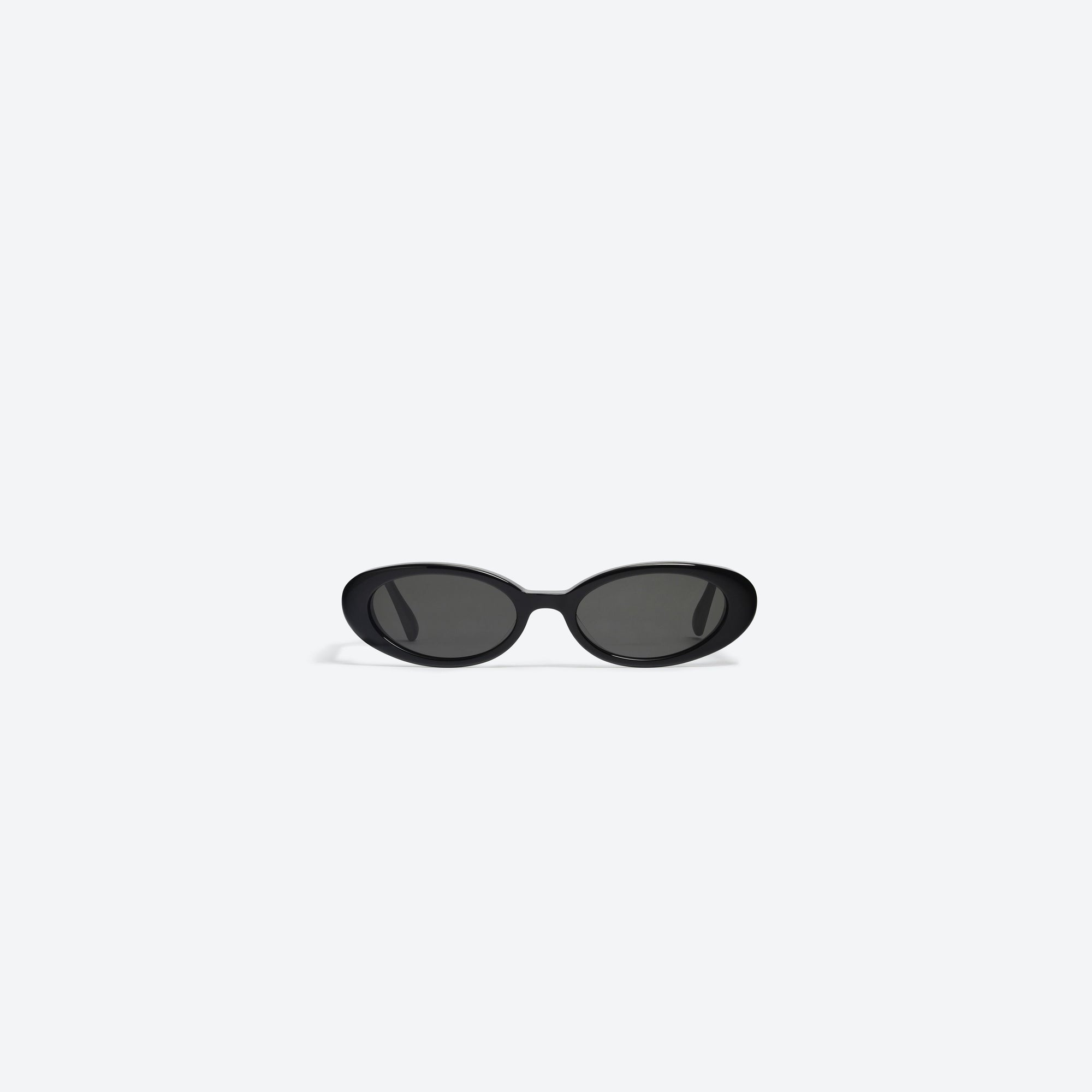 A front view of Gentle Monster Dua 01 Black Acetate framed Oval sunglasses.