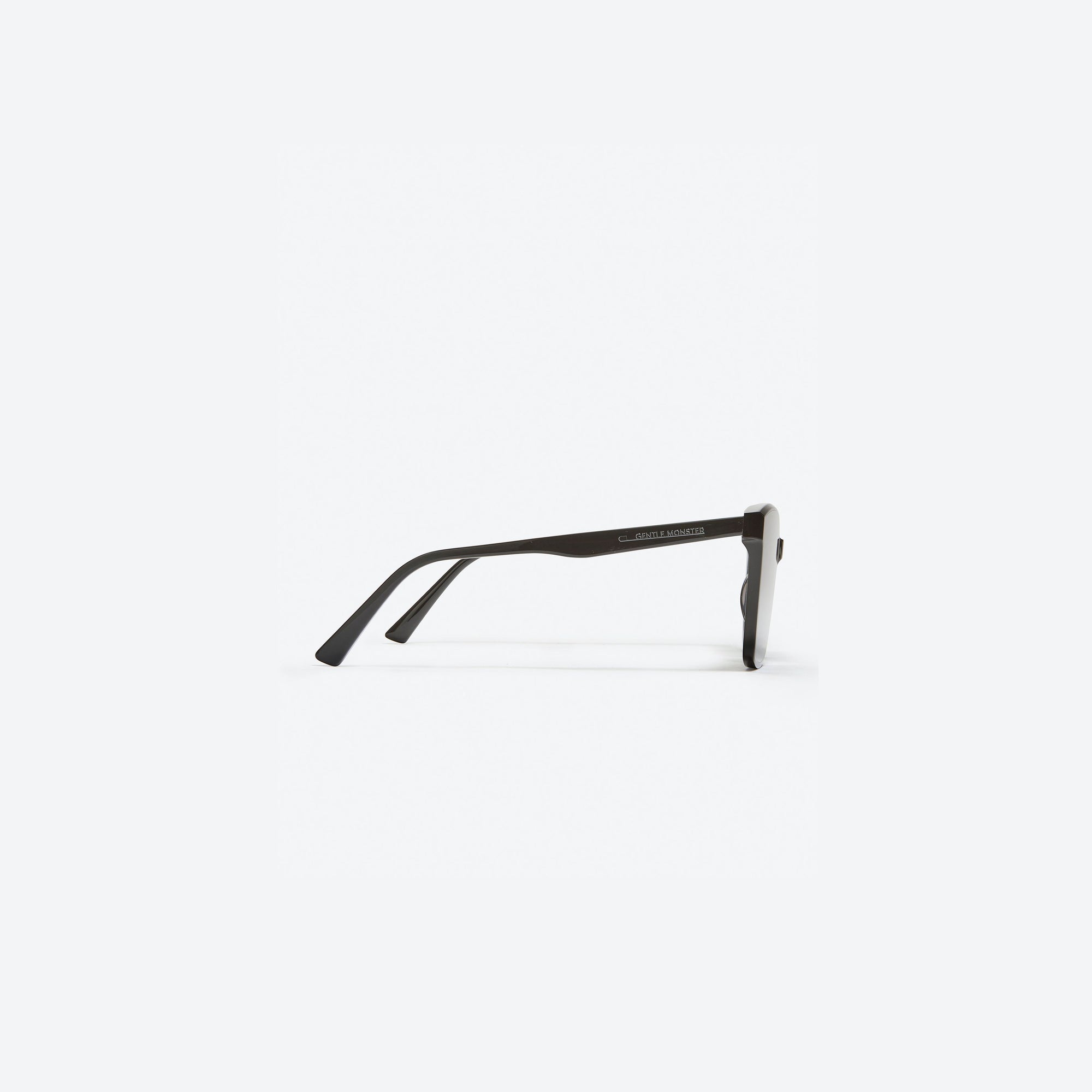 A detailed right view of Gentle Monster Tega 01 Black Acetate framed Square sunglasses.