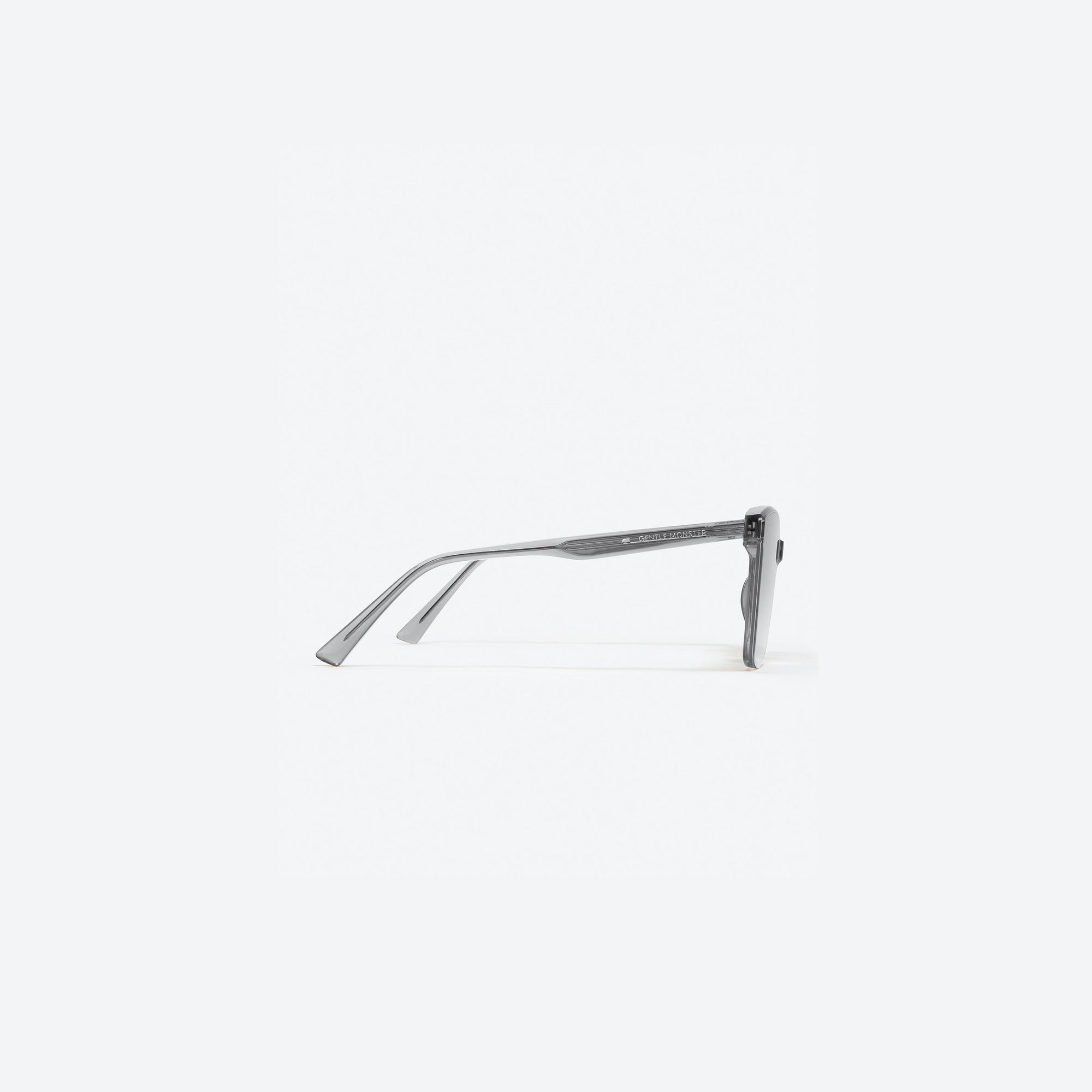 A detailed right view of Gentle Monster Tega G1 Gray Acetate framed Square sunglasses.