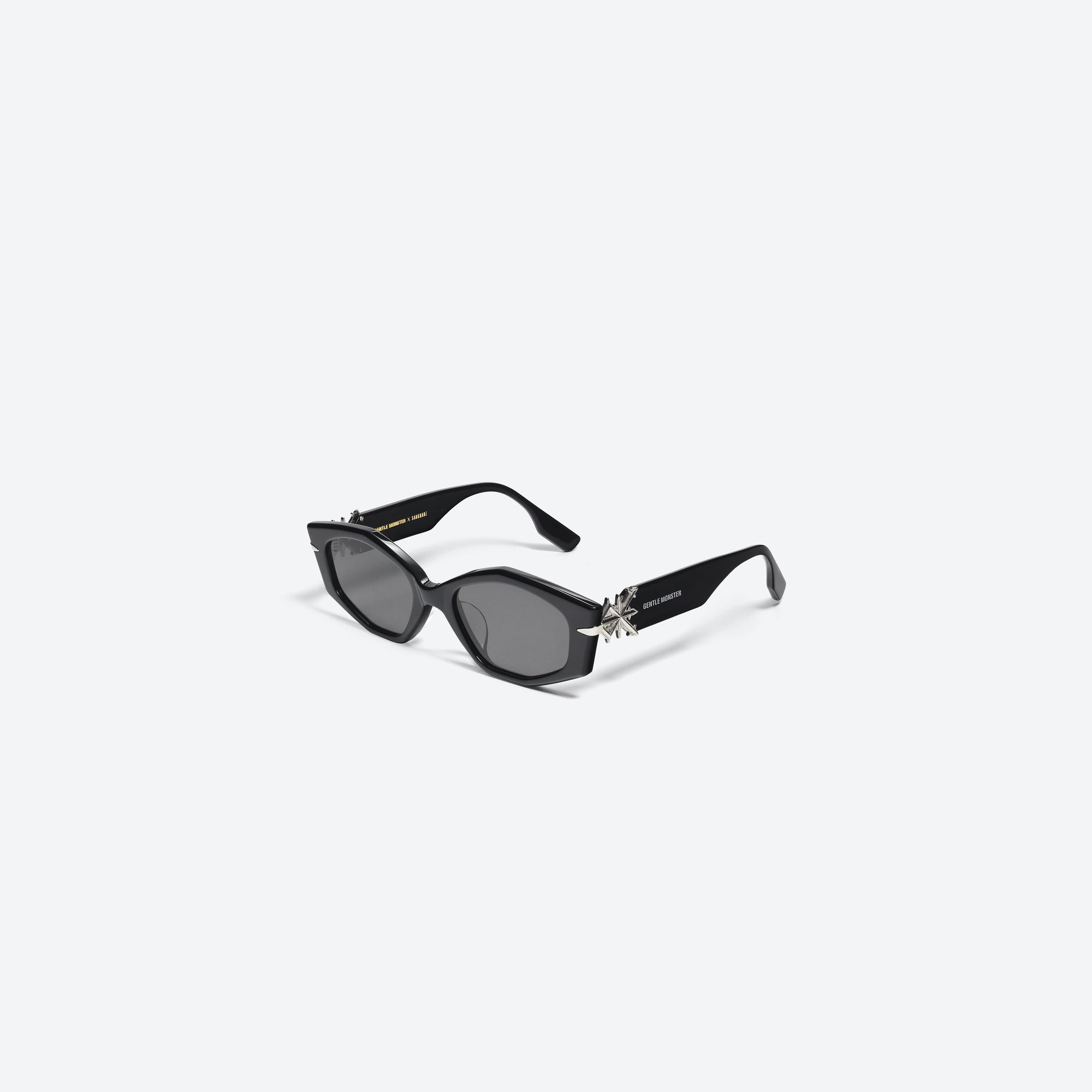 45-degree view of Gentle Monster SANKUANZ - Cilice 01 Black Acetate framed Cat-eye sunglasses.
