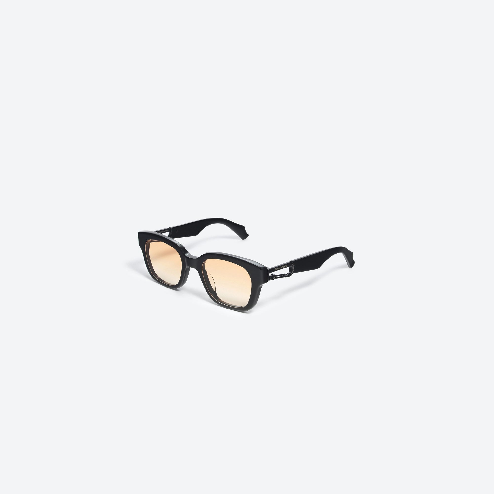 45-degree view of Gentle Monster Ambush - Carabiner 1 01(OR) Black Mixed framed Square sunglasses.