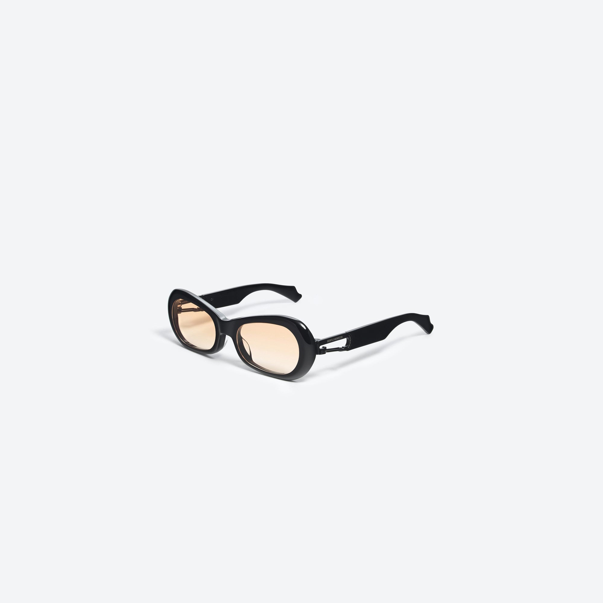 45-degree view of Gentle Monster Ambush - Carabiner 2 01(OR) Black Mixed framed Cat-eye sunglasses.