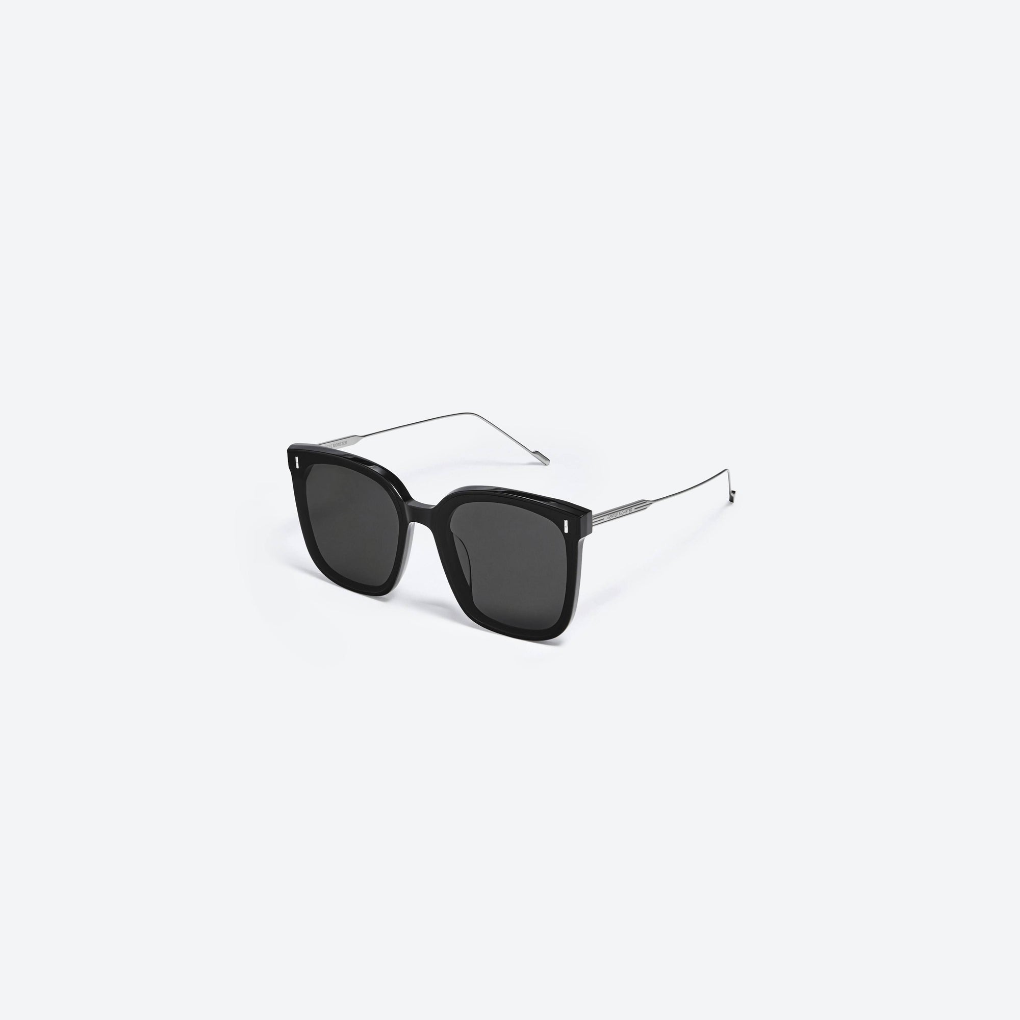 45-degree view of Gentle Monster Frida.YK 01 Black Mixed framed Square sunglasses.