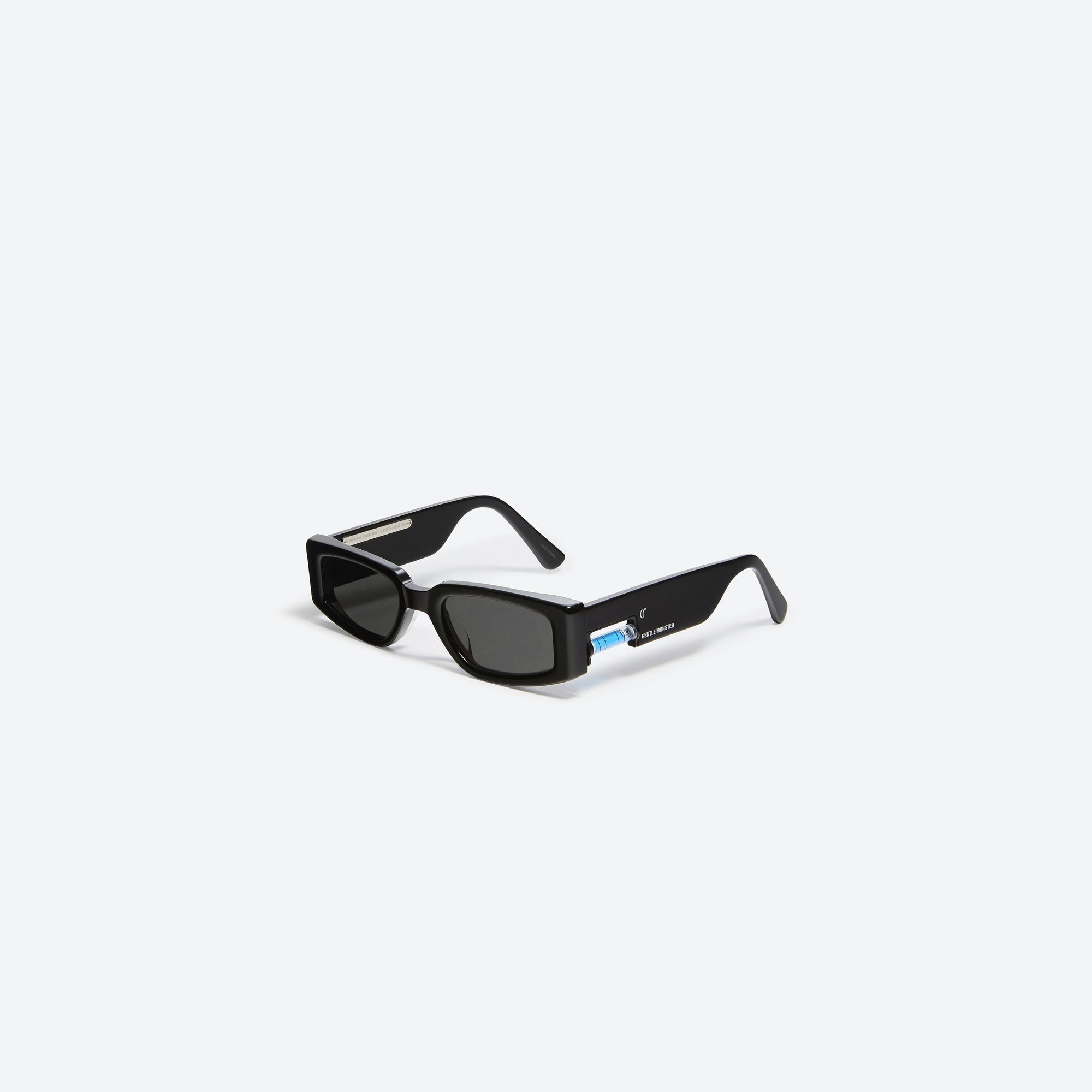 45-degree view of Gentle Monster Heron Preston - Level 0 01(B) Similar Black Acetate framed Square sunglasses.