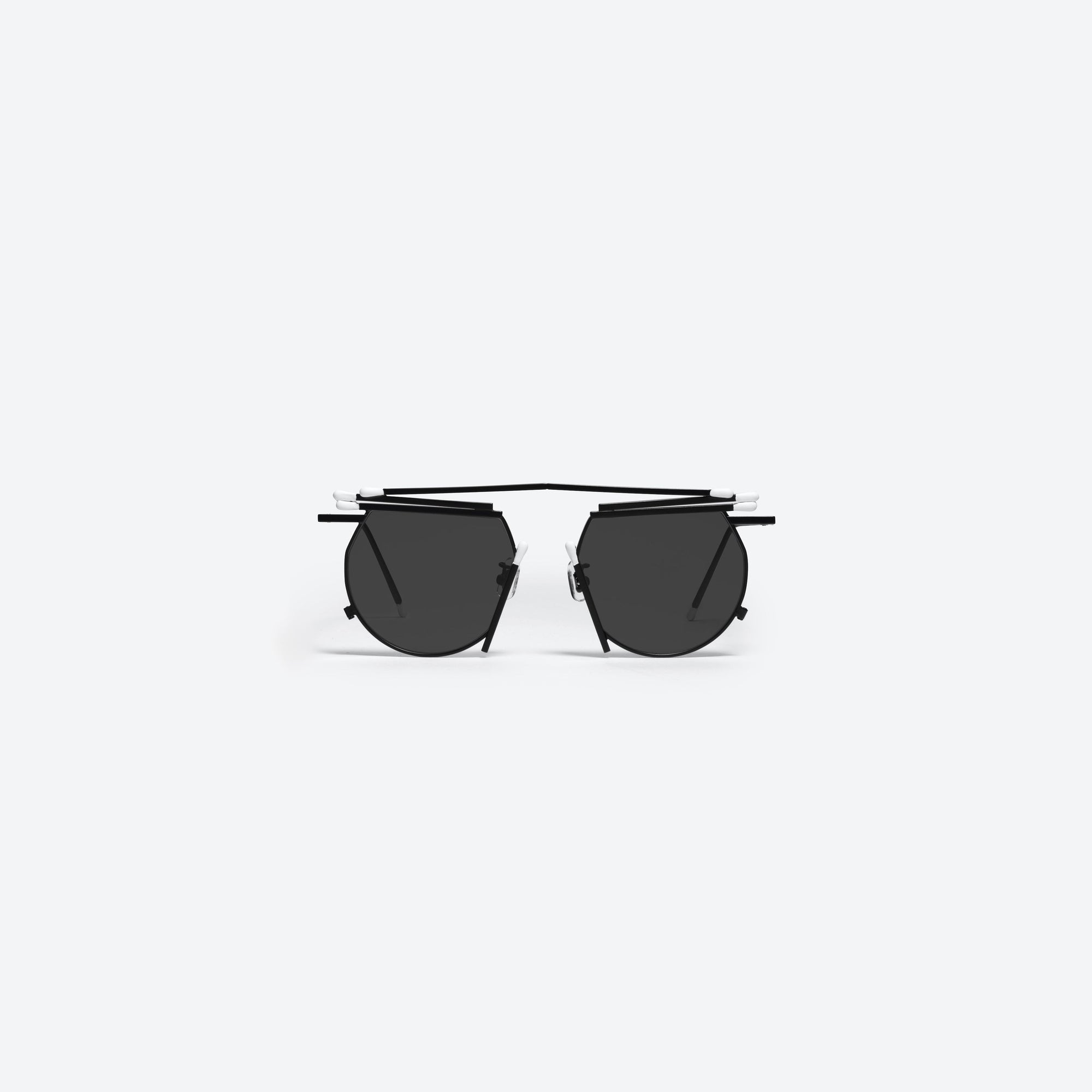 A front view of Gentle Monster Henrik Vibskov - Matches Glasses M01 Black Metal framed Round sunglasses.