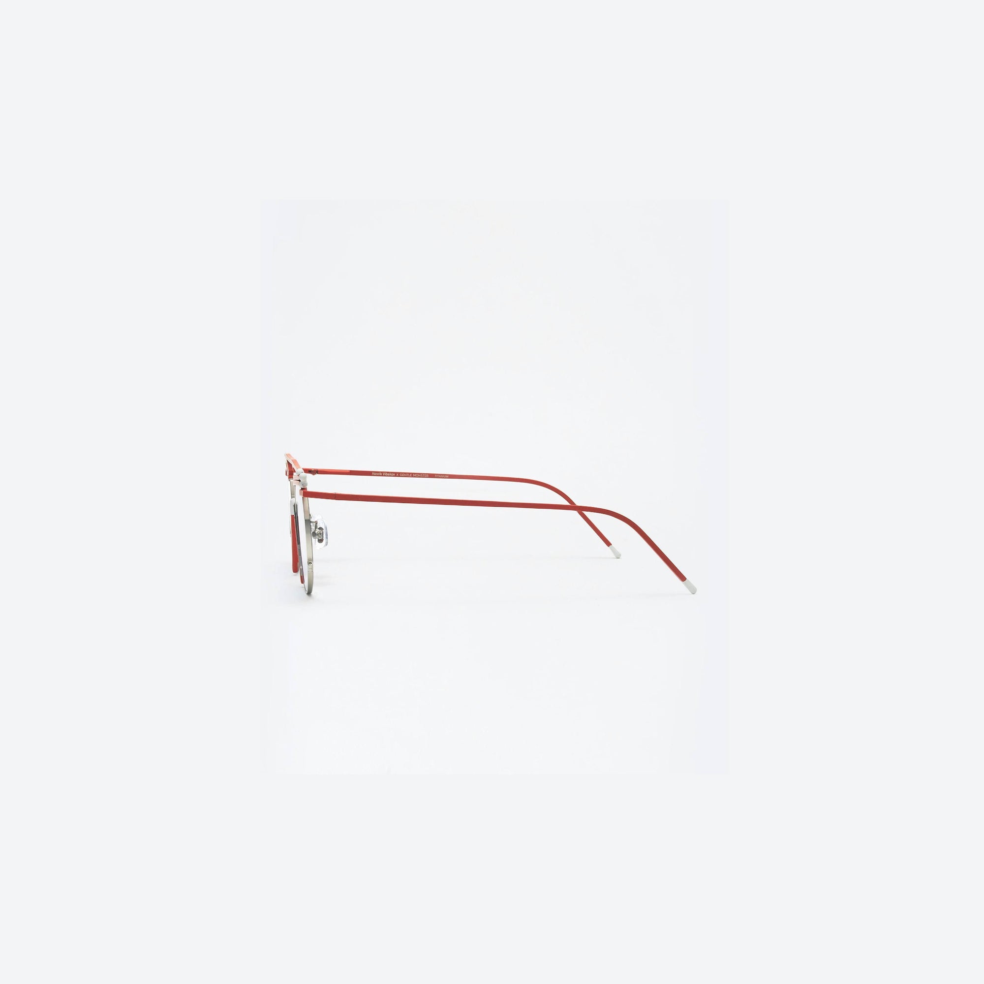 A detailed right view of Gentle Monster Henrik Vibskov - Matches Glasses MR1 Red Metal framed Round sunglasses.