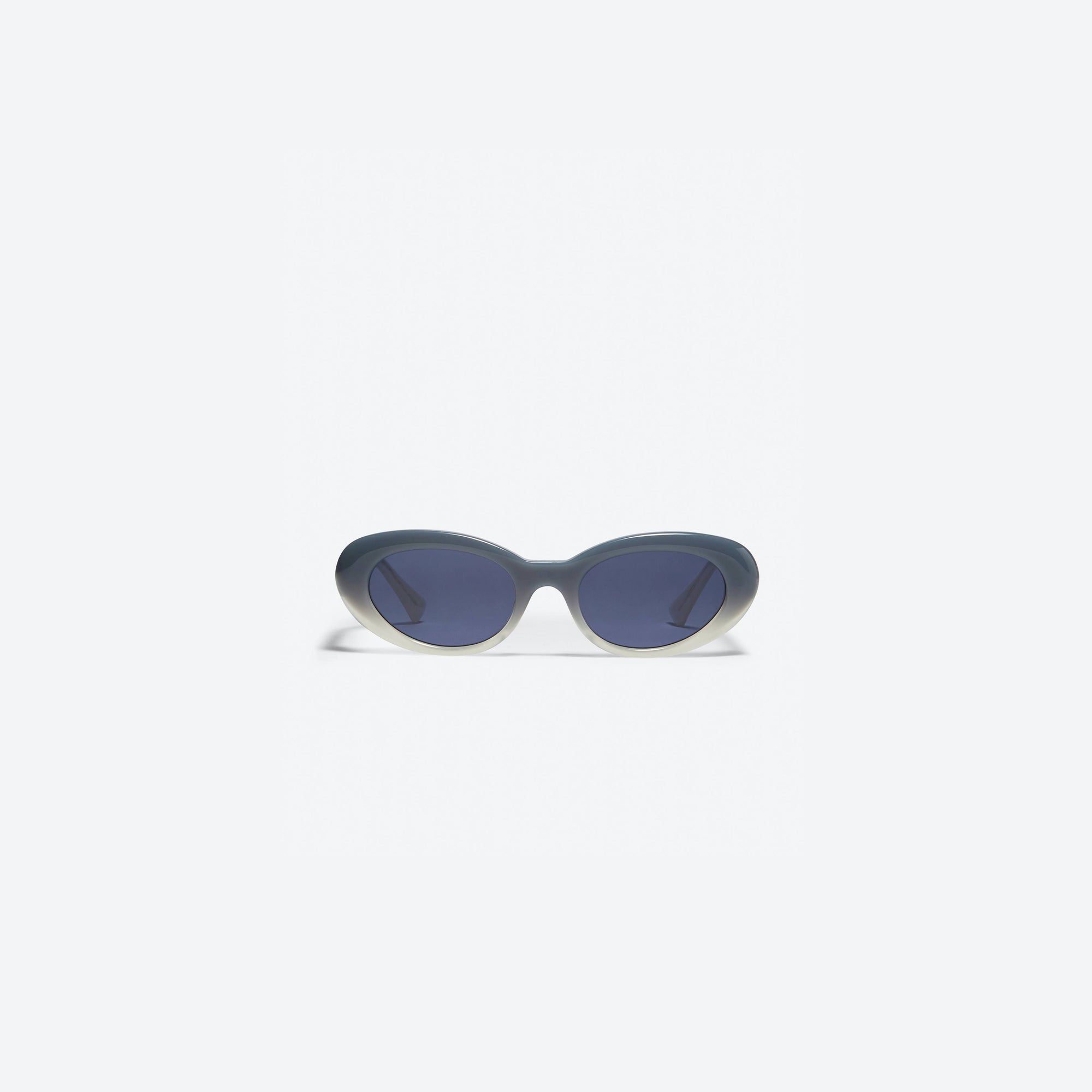 A front view of Gentle Monster Le IBG1 Blue Acetate framed Oval sunglasses.