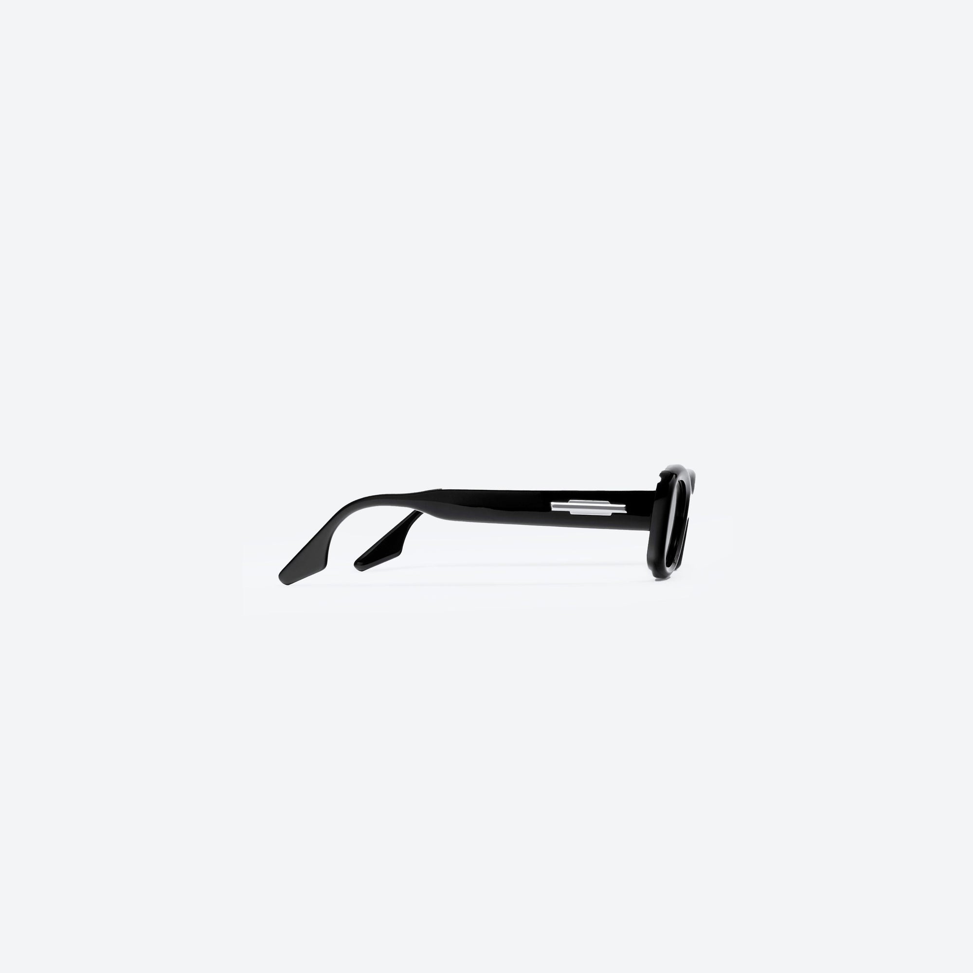 A detailed right view of Gentle Monster Tambu 01 Black Acetate framed Square sunglasses.