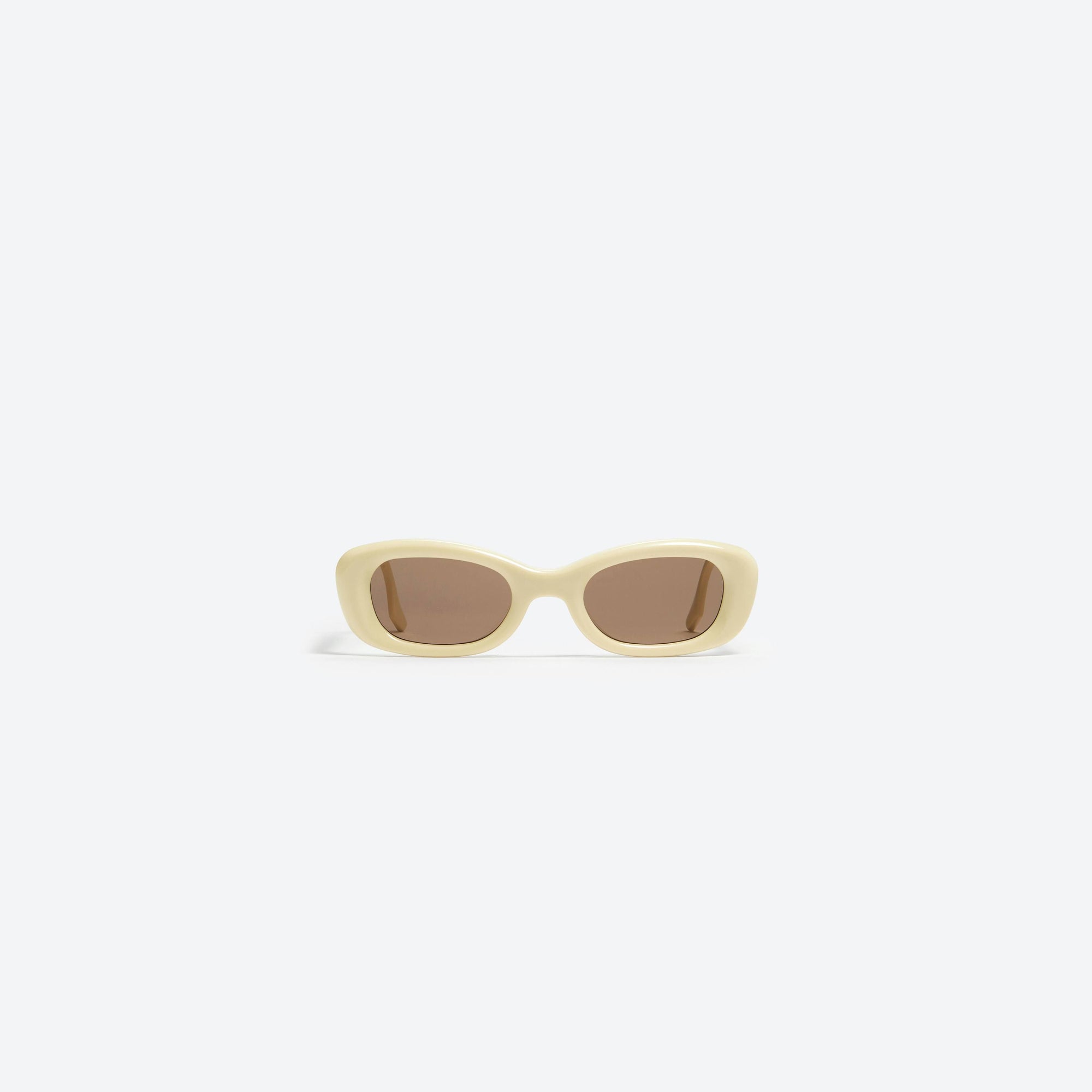 A front view of Gentle Monster Tambu Y4 Yellow Acetate framed Square sunglasses.