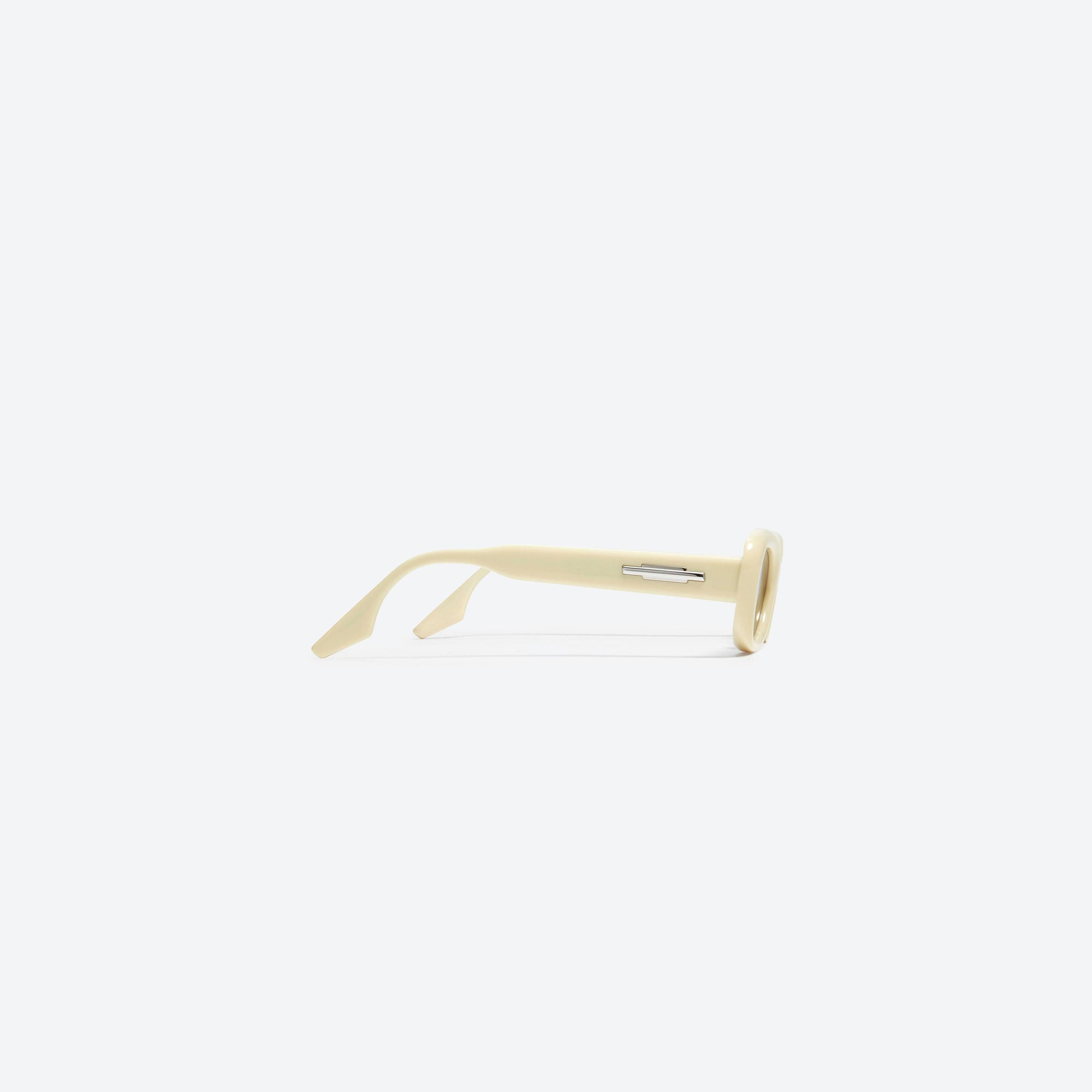 A detailed right view of Gentle Monster Tambu Y4 Yellow Acetate framed Square sunglasses.