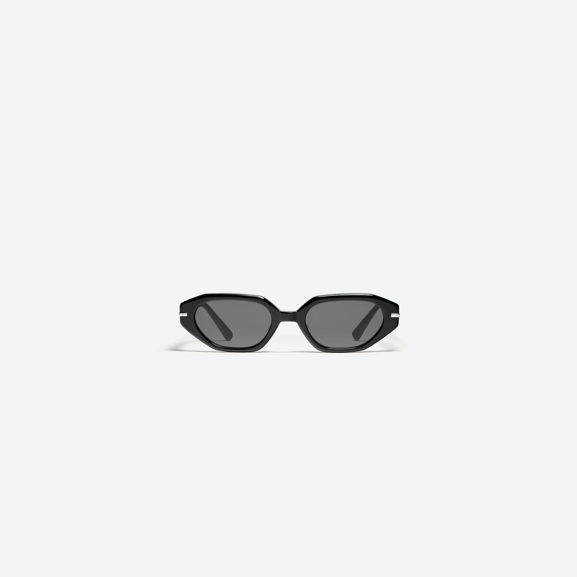 A front view of Gentle Monster Corsica 01 Black Acetate framed Oval sunglasses.