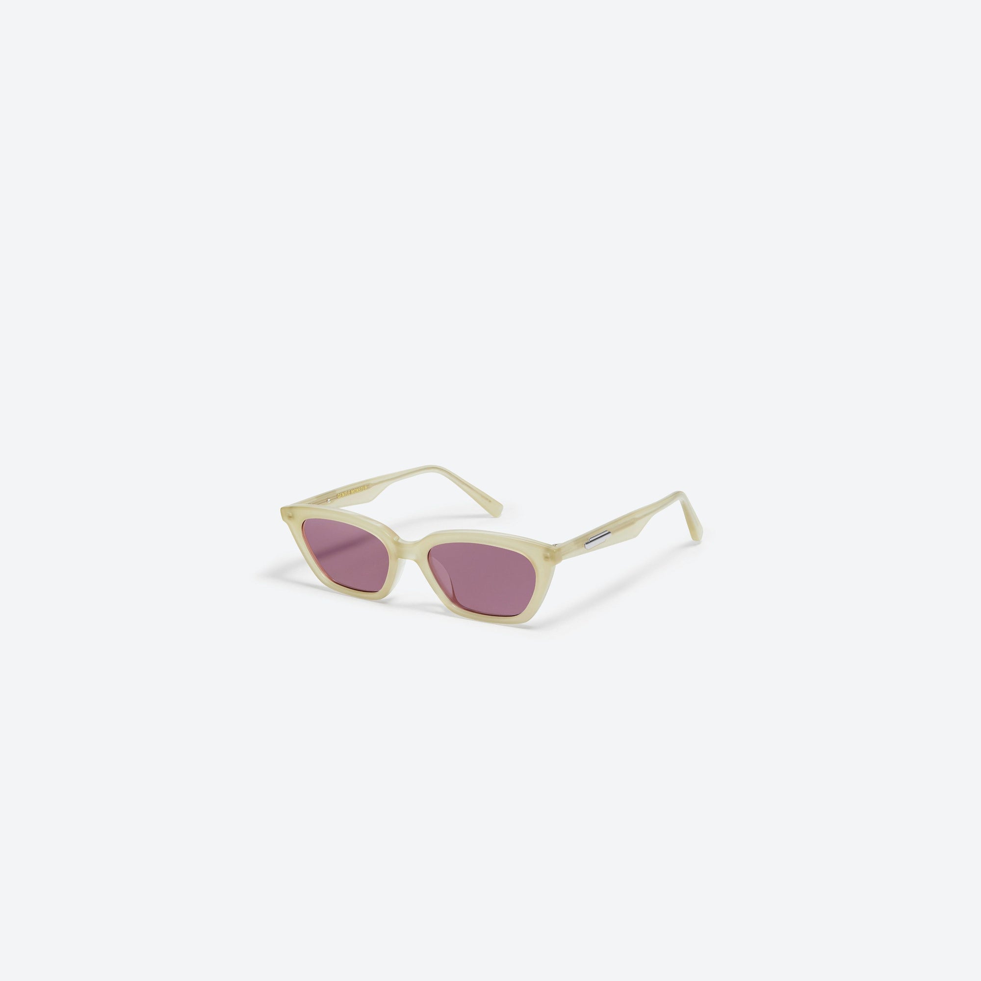 45-degree view of Gentle Monster Loti IC1 Ivory Acetate framed Cat-eye sunglasses.