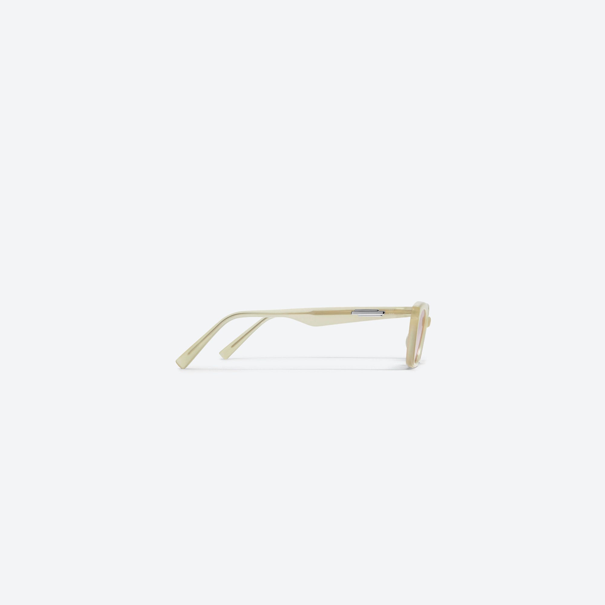A detailed right view of Gentle Monster Loti IC1 Ivory Acetate framed Cat-eye sunglasses.