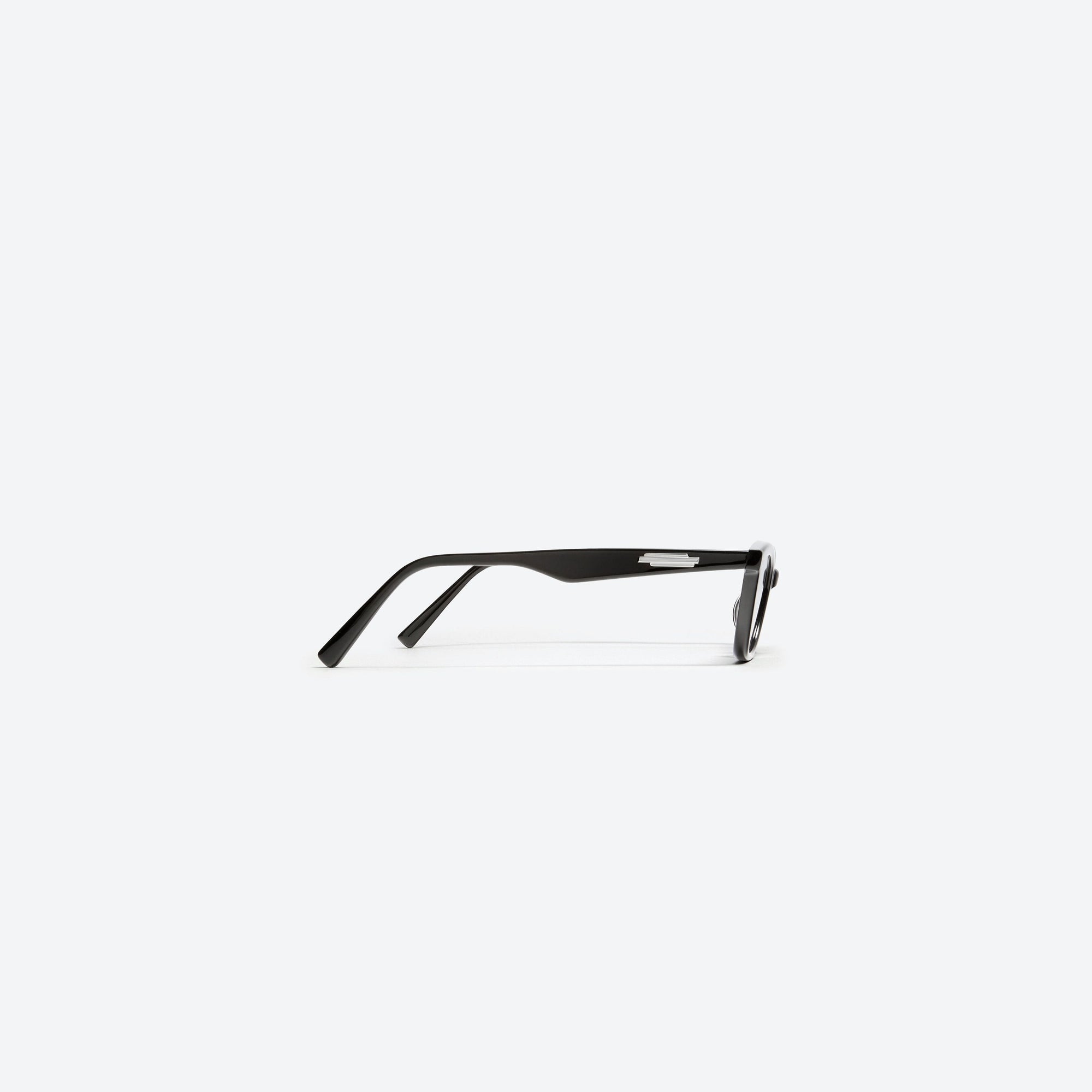 A detailed right view of Gentle Monster Loti 01 Black Acetate framed Cat-eye sunglasses.
