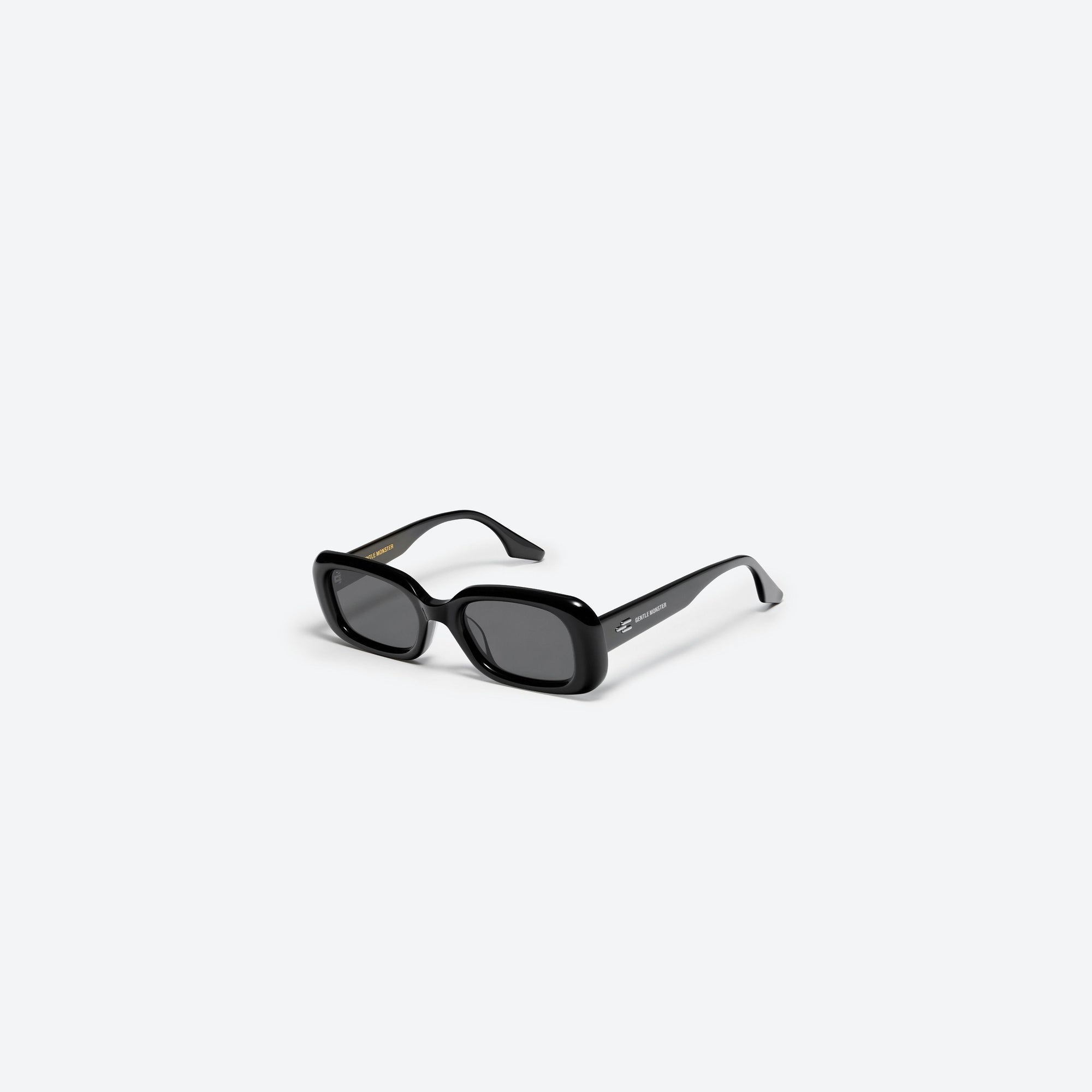 45-degree view of Gentle Monster Bliss 01 Black Acetate framed Square sunglasses.