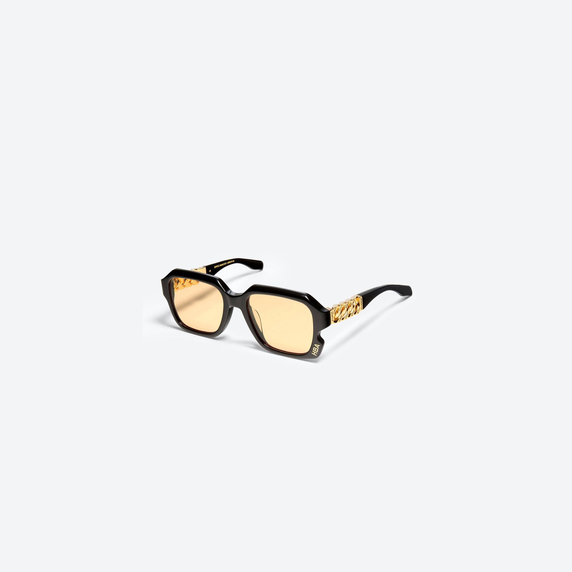 45-degree view of Gentle Monster HBA - Mother 01(OR) Black Mixed framed Wraparound sunglasses.