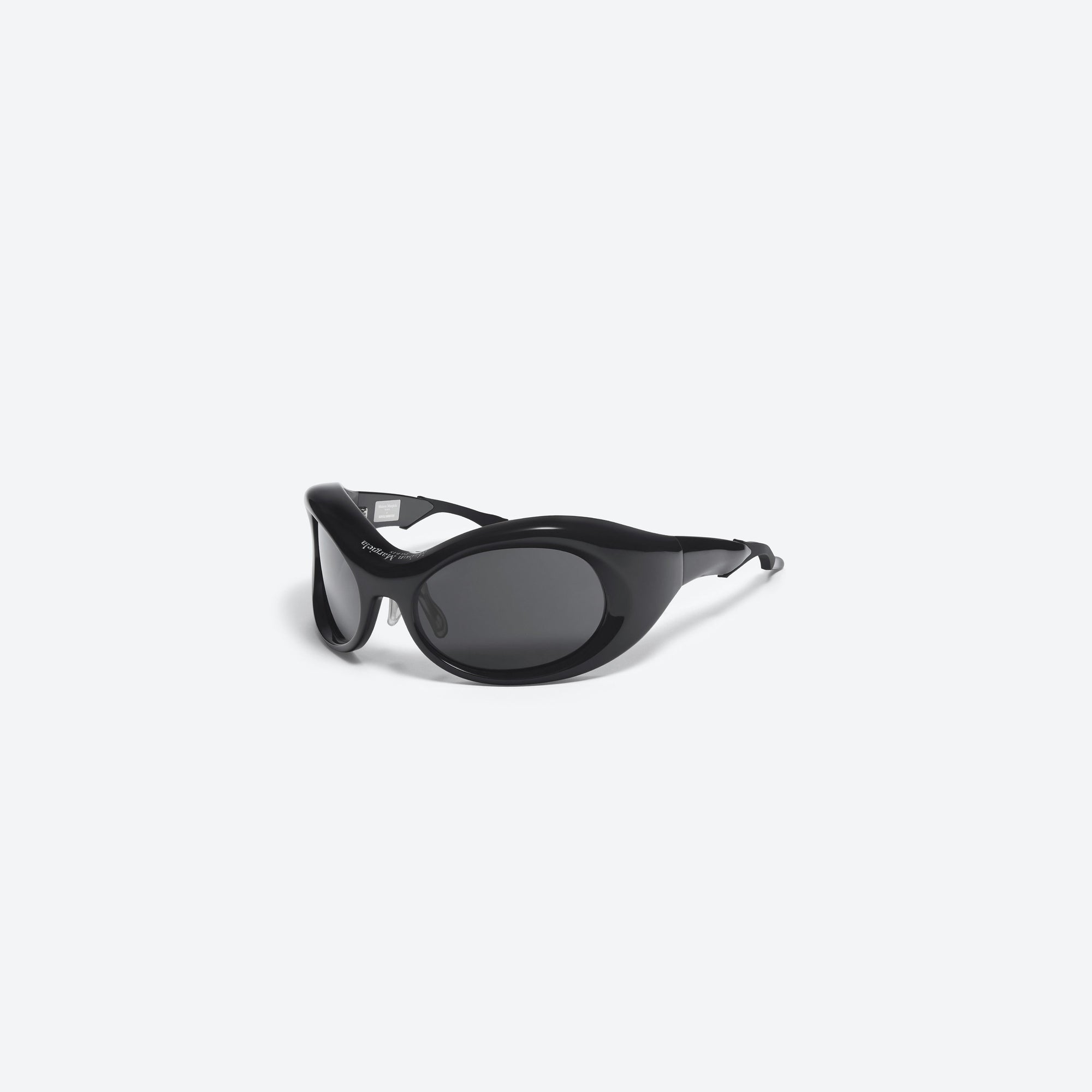 45-degree view of Gentle Monster Maison Margiela - MM001 01 Black Acetate framed Wraparound sunglasses.