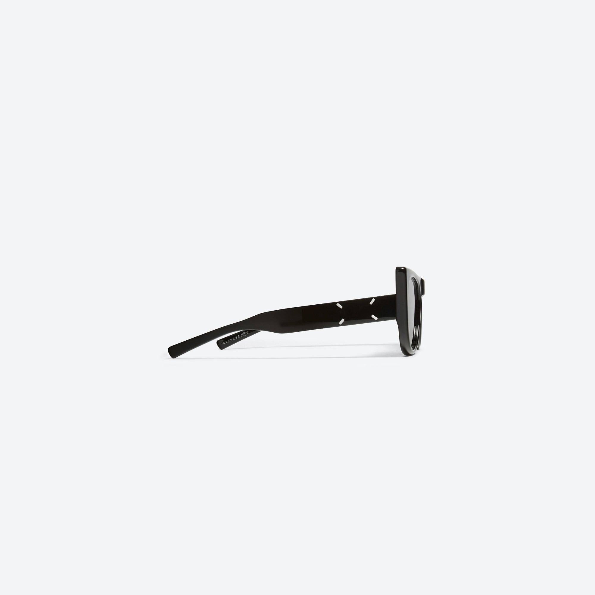 A detailed right view of Gentle Monster Maison Margiela - MM008 01(C) Black Acetate framed Cat-eye sunglasses.