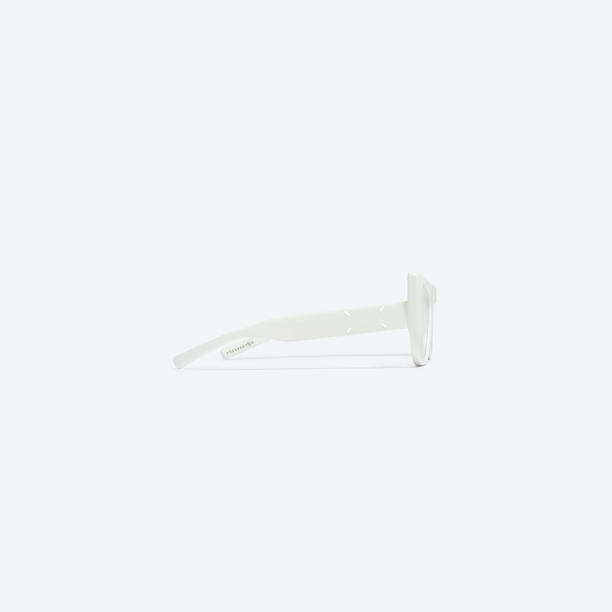 A detailed right view of Gentle Monster Maison Margiela - MM008 W2(C) White Acetate framed Cat-eye sunglasses.