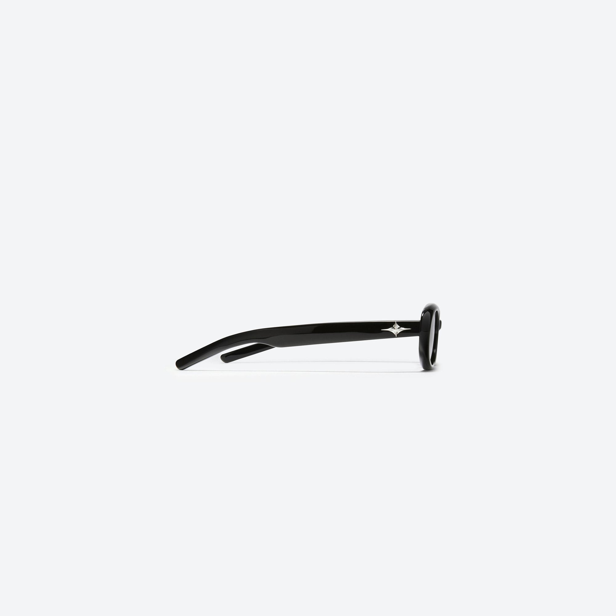 A detailed right view of Gentle Monster Bandoneon.S 01 Black Acetate framed Oval sunglasses.