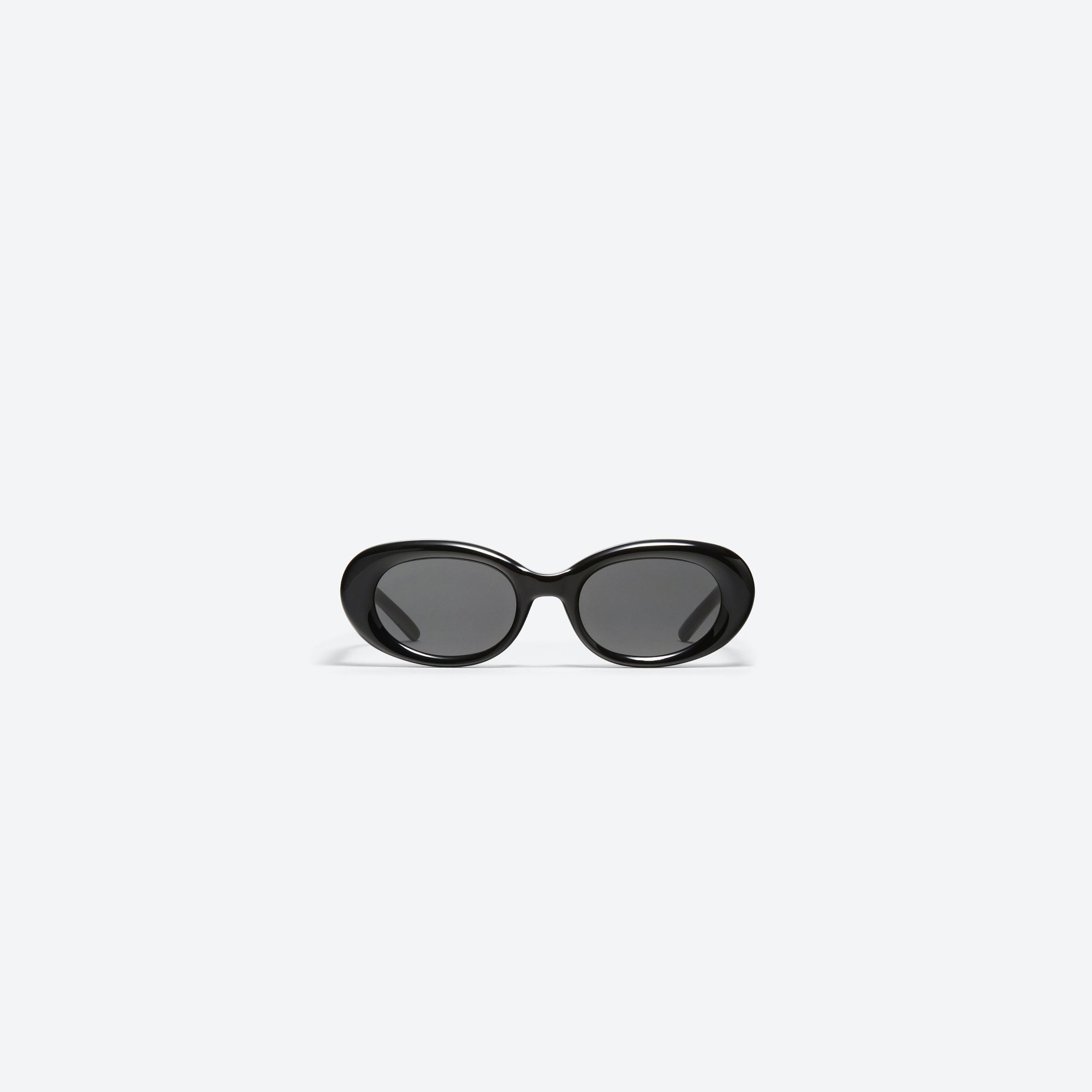 A front view of Gentle Monster Eve 01 Black Acetate framed Oval sunglasses.