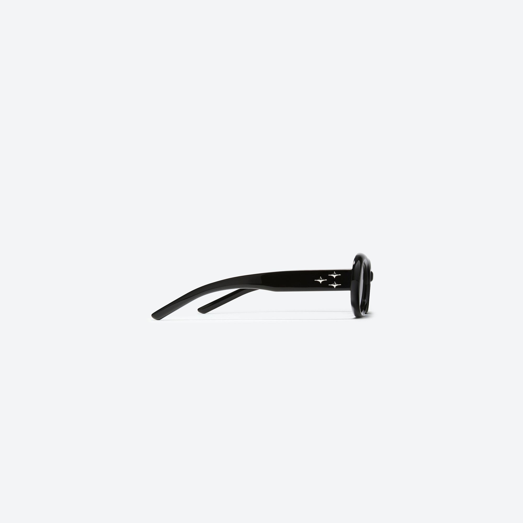 A detailed right view of Gentle Monster Eve 01 Black Acetate framed Oval sunglasses.