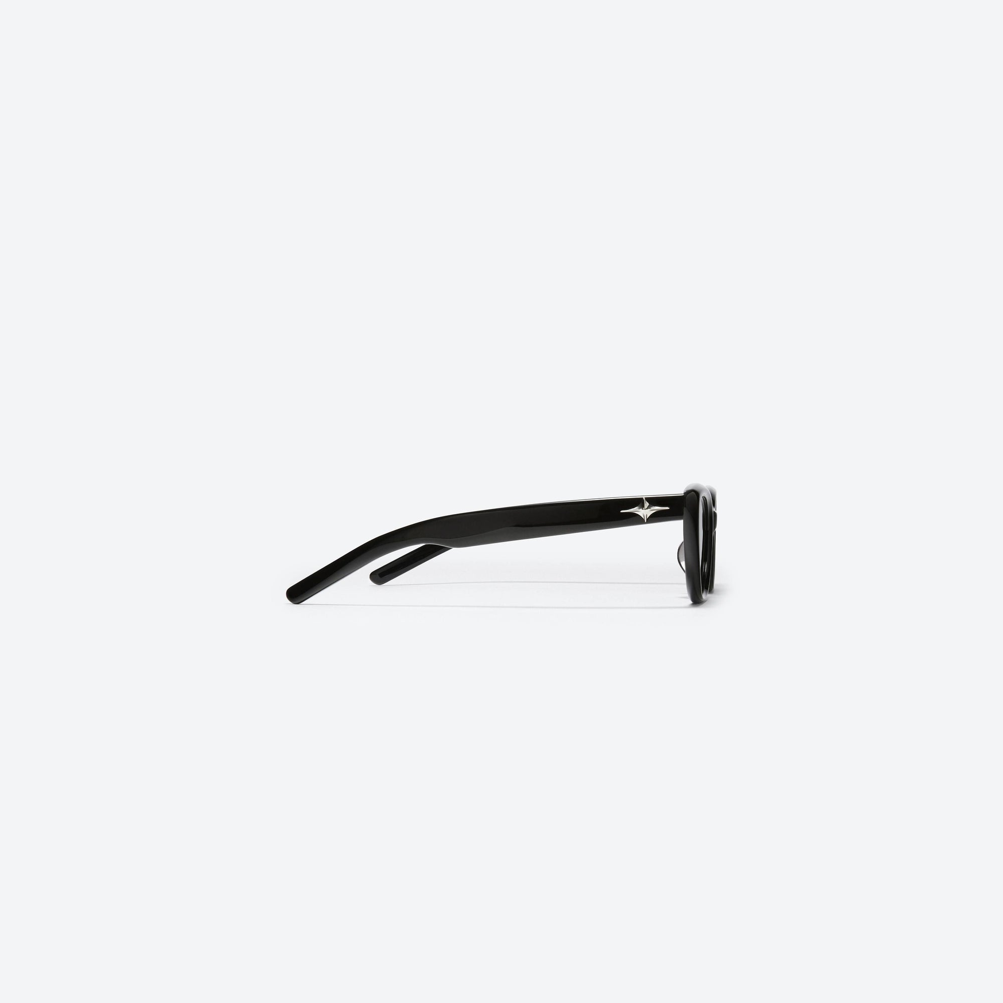 A detailed right view of Gentle Monster Sound Net 01 Black Acetate framed Cat-eye sunglasses.