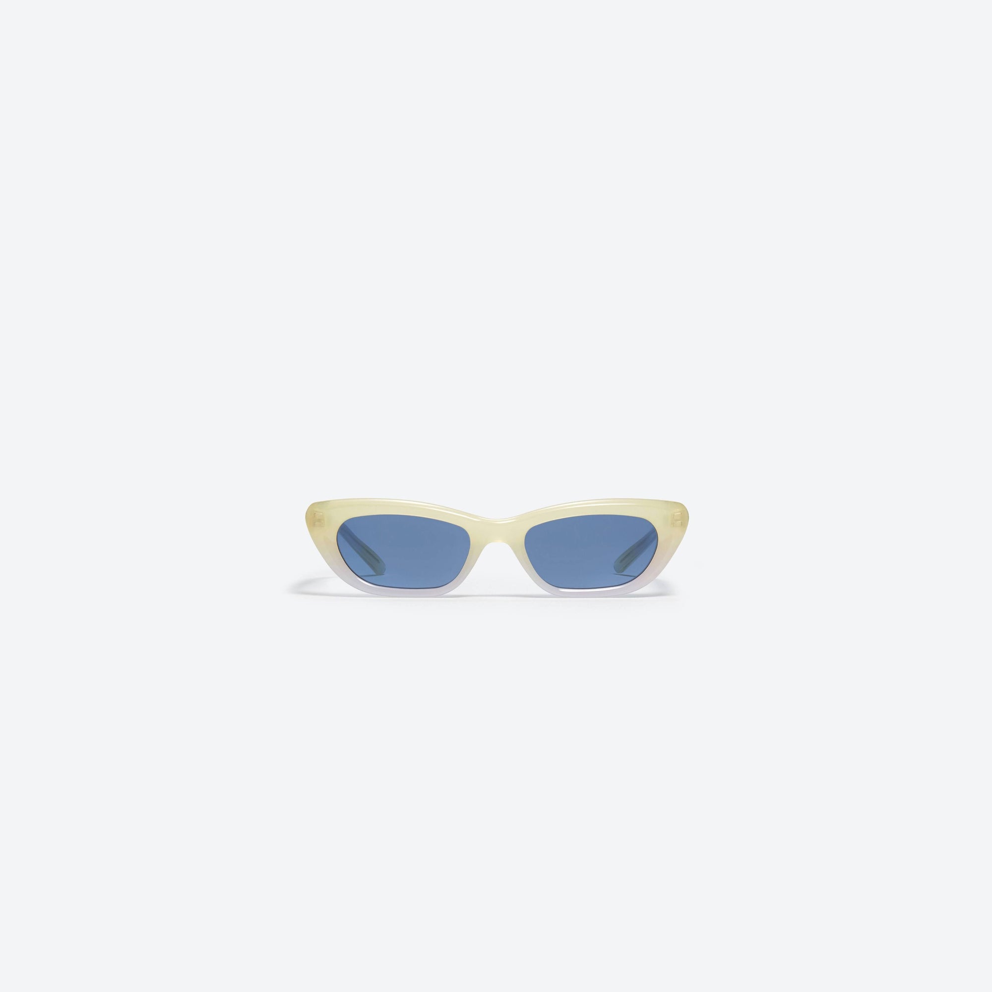 A front view of Gentle Monster 27And 7 YVG1 Yellow Acetate framed Cat-eye sunglasses.