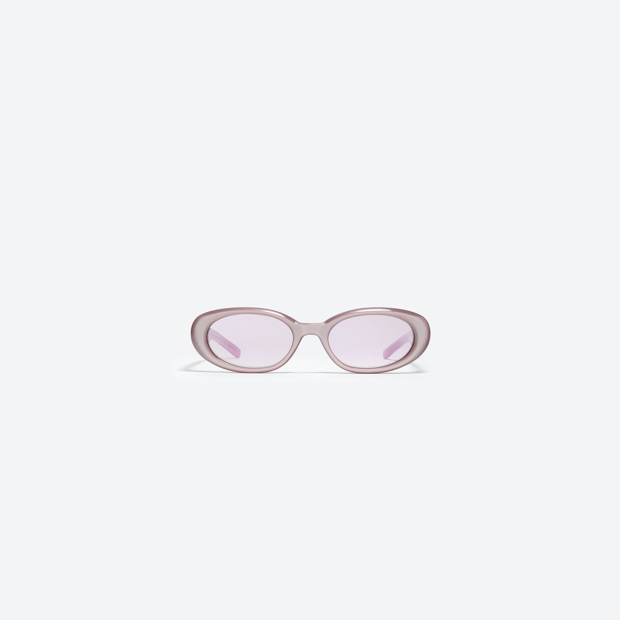 A front view of Gentle Monster Bandoneon.S PC5 Pink Acetate framed Oval sunglasses.
