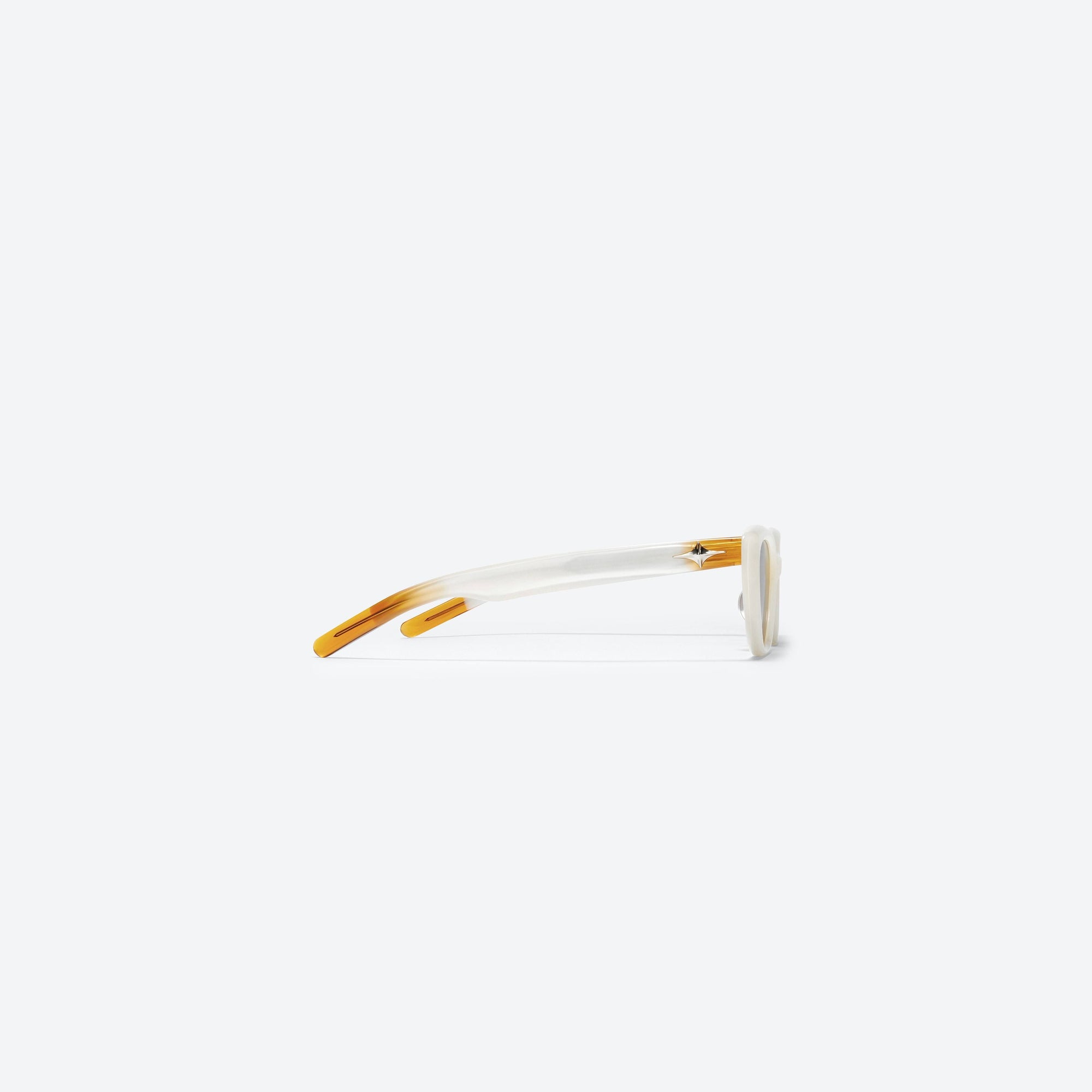 A detailed right view of Gentle Monster Sound Net WC6 Ivory Acetate framed Cat-eye sunglasses.