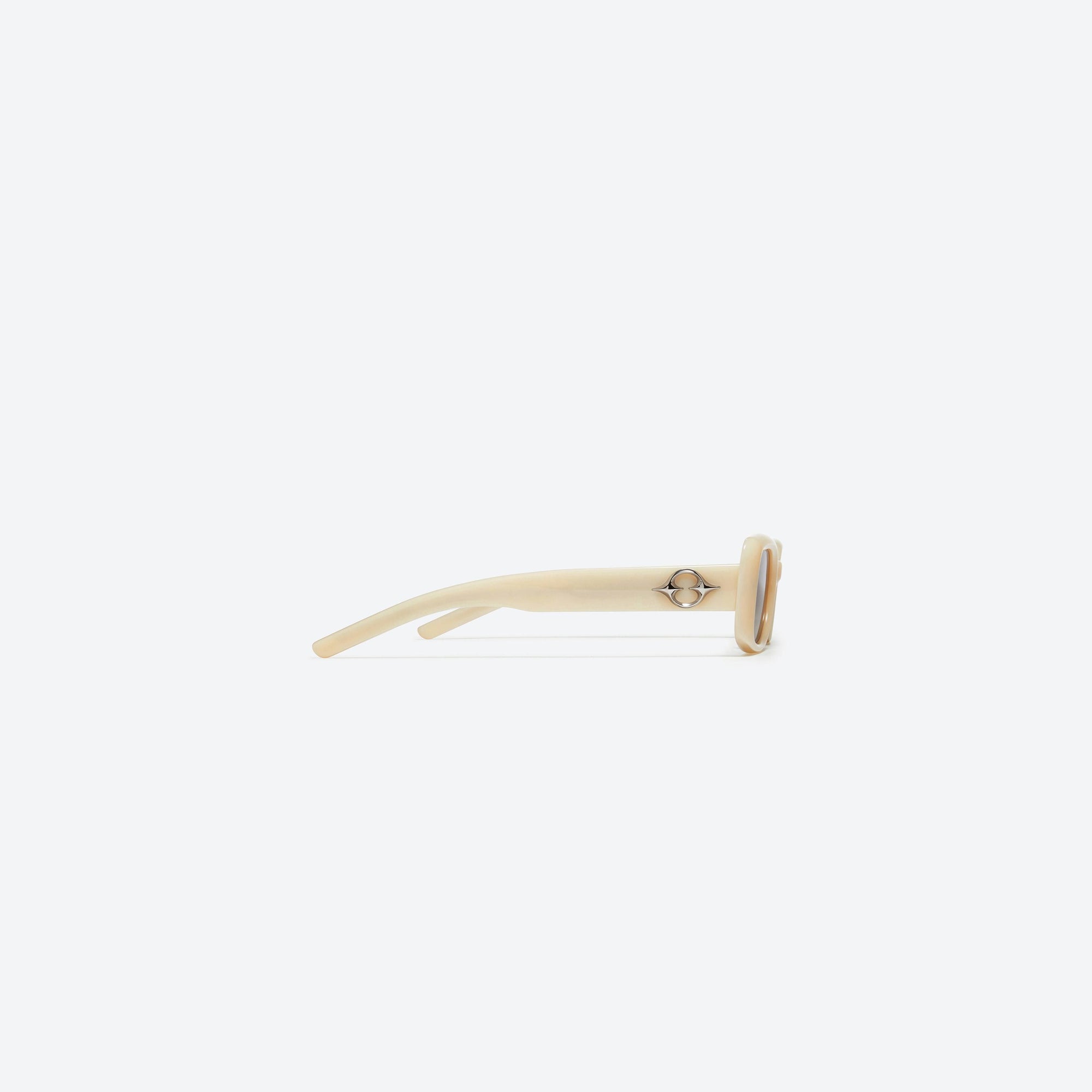 A detailed right view of Gentle Monster The Bell IV1 Ivory Acetate framed Square sunglasses.