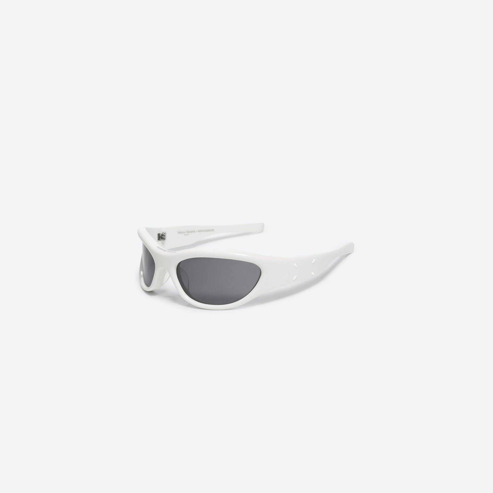 45-degree view of Gentle Monster Maison Margiela - MM003 W2 White Acetate framed Wraparound sunglasses.