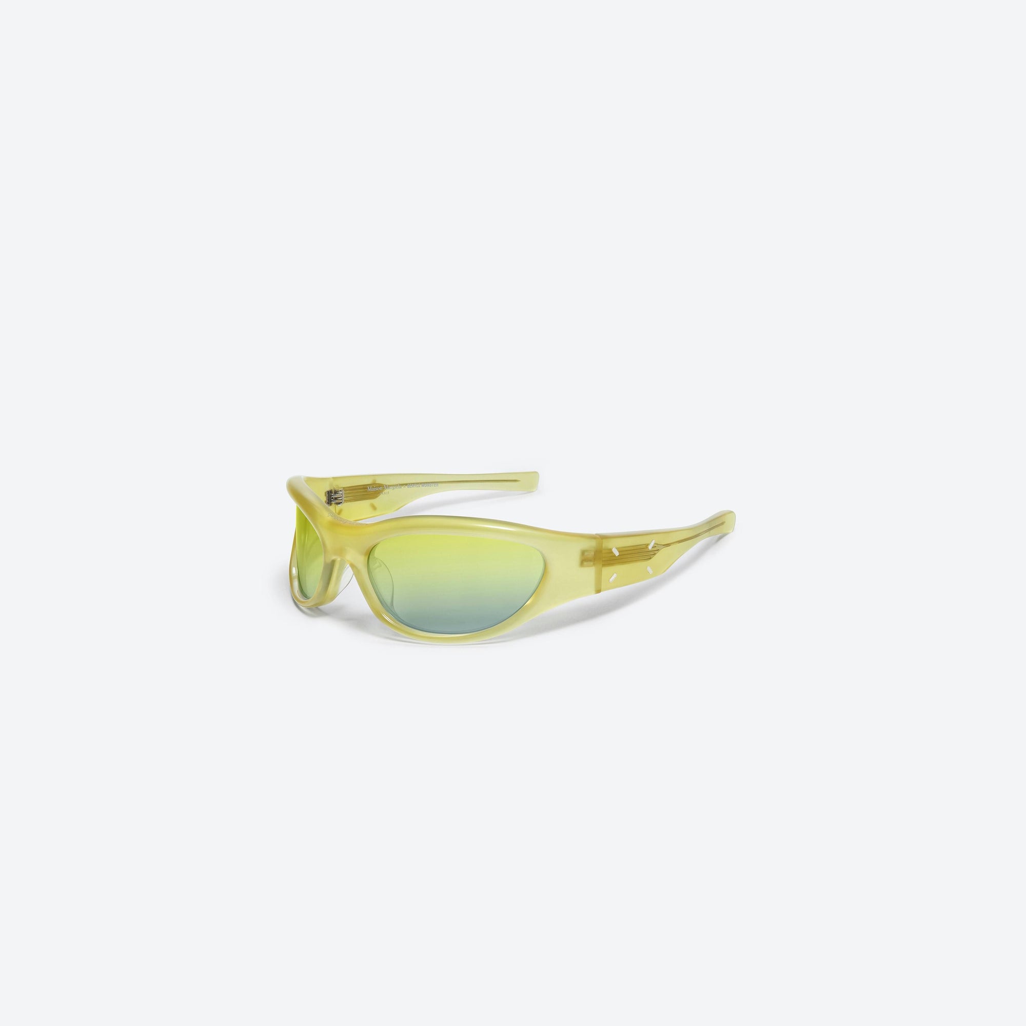 45-degree view of Gentle Monster Maison Margiela - MM003 OL3 Green Acetate framed Wraparound sunglasses.