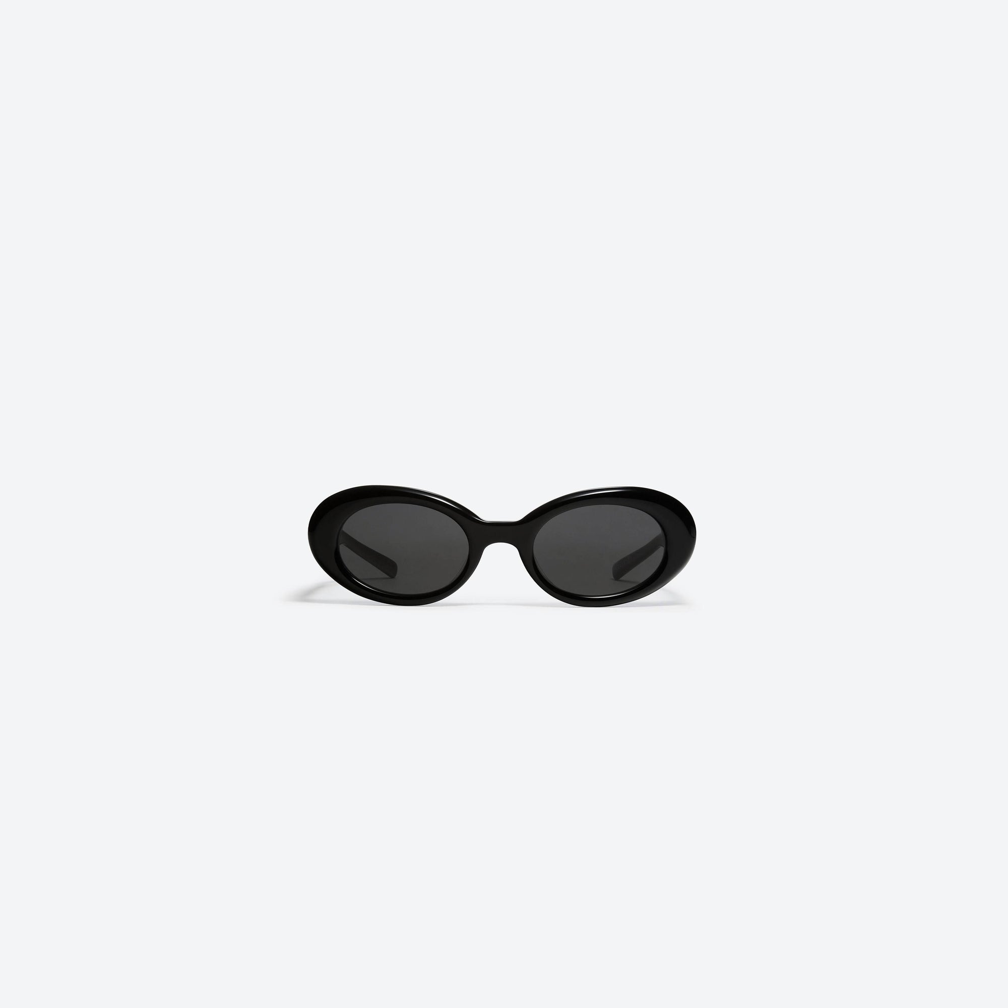A front view of Gentle Monster Maison Margiela - MM005 01 Black Acetate framed Oval sunglasses.