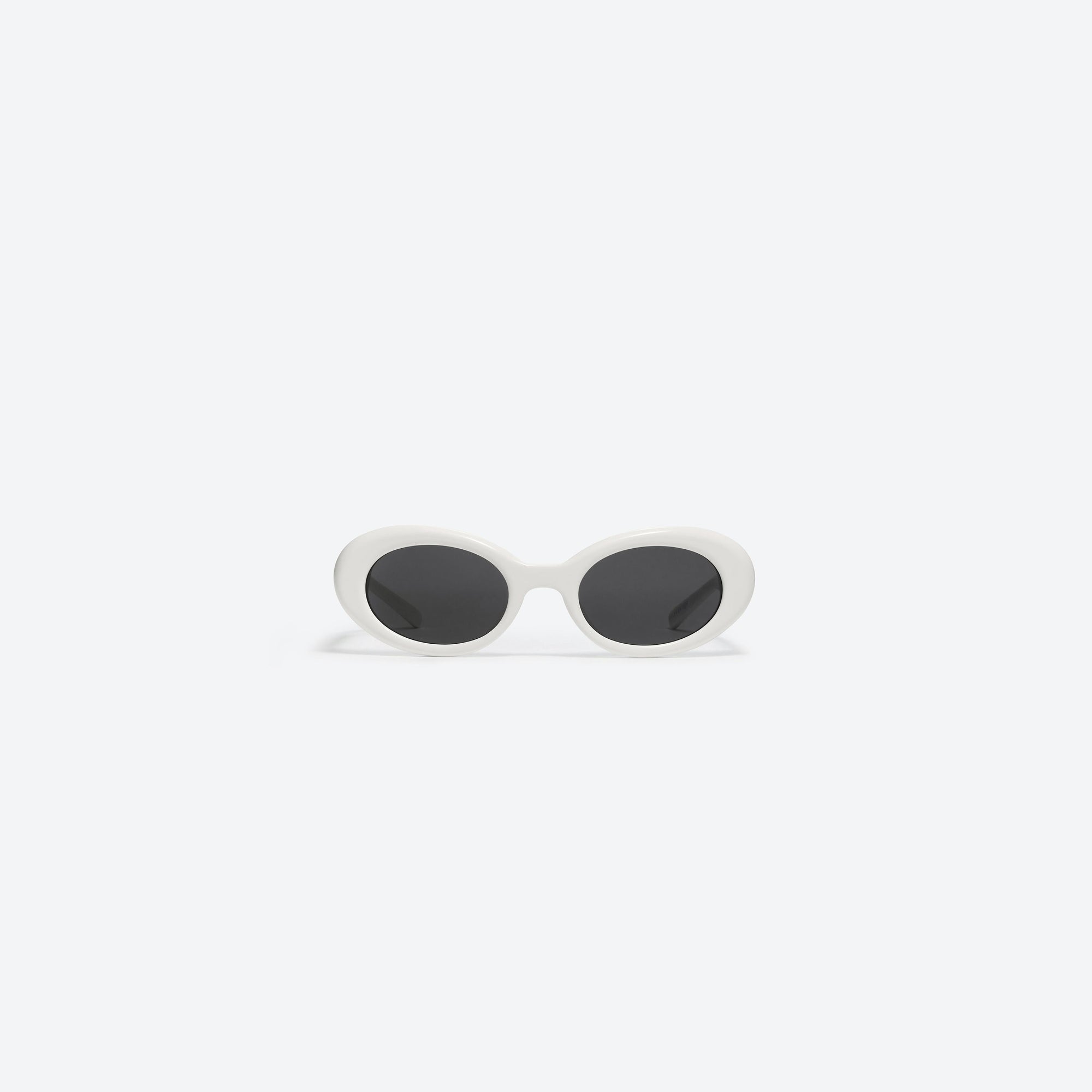 A front view of Gentle Monster Maison Margiela - MM005 W2 White Acetate framed Oval sunglasses.