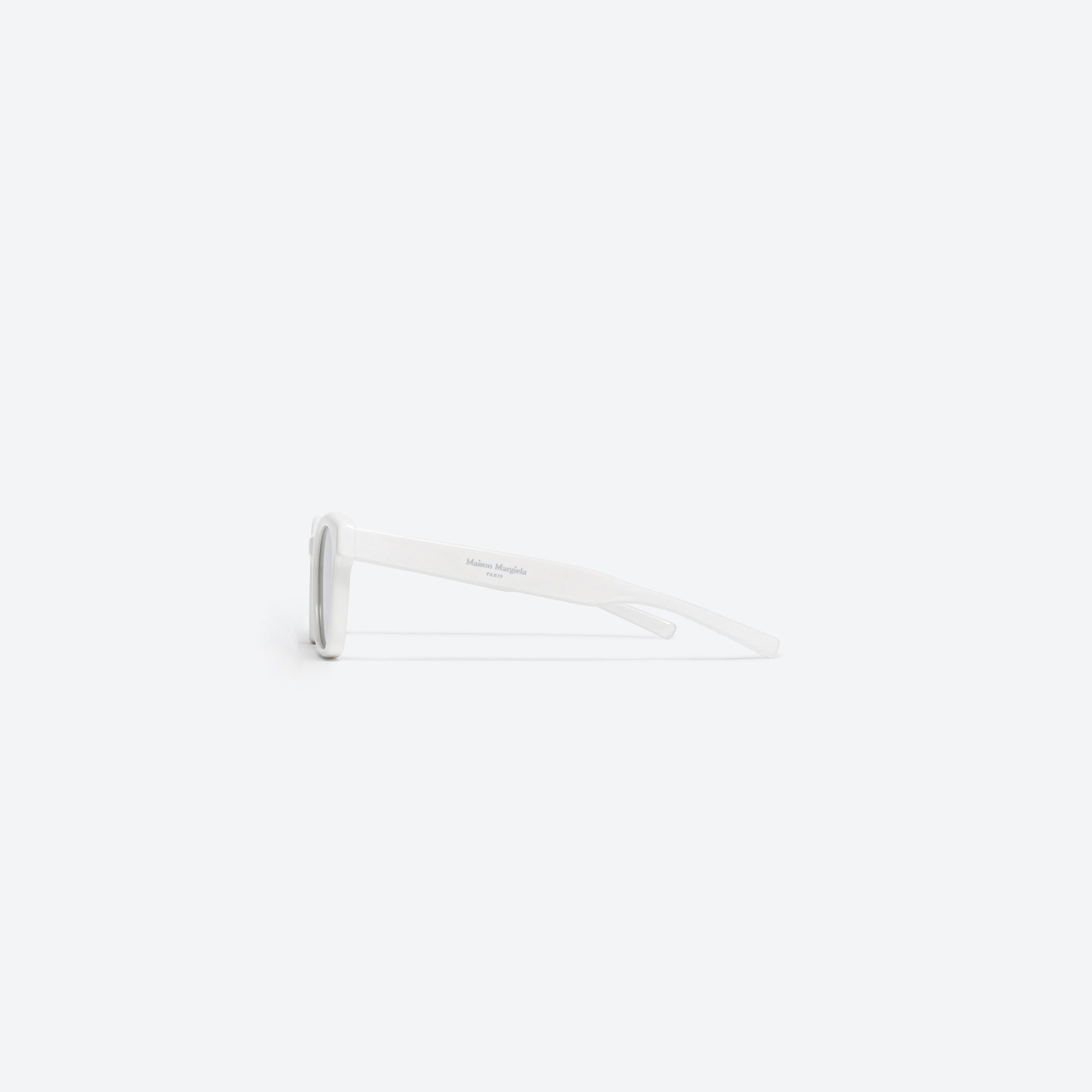 A detailed right view of Gentle Monster Maison Margiela - MM006 W2 White Acetate framed Square sunglasses.