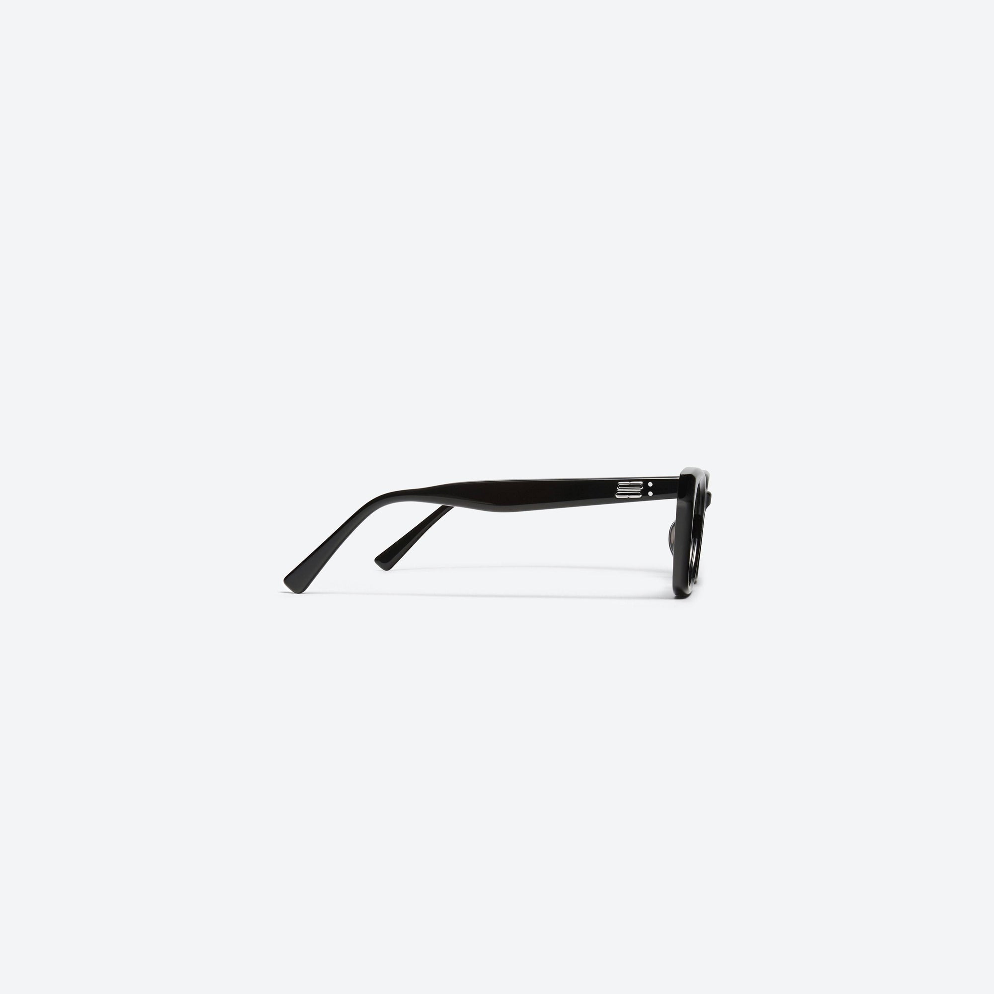 A detailed right view of Gentle Monster Hue 01 Black Acetate framed Square sunglasses.