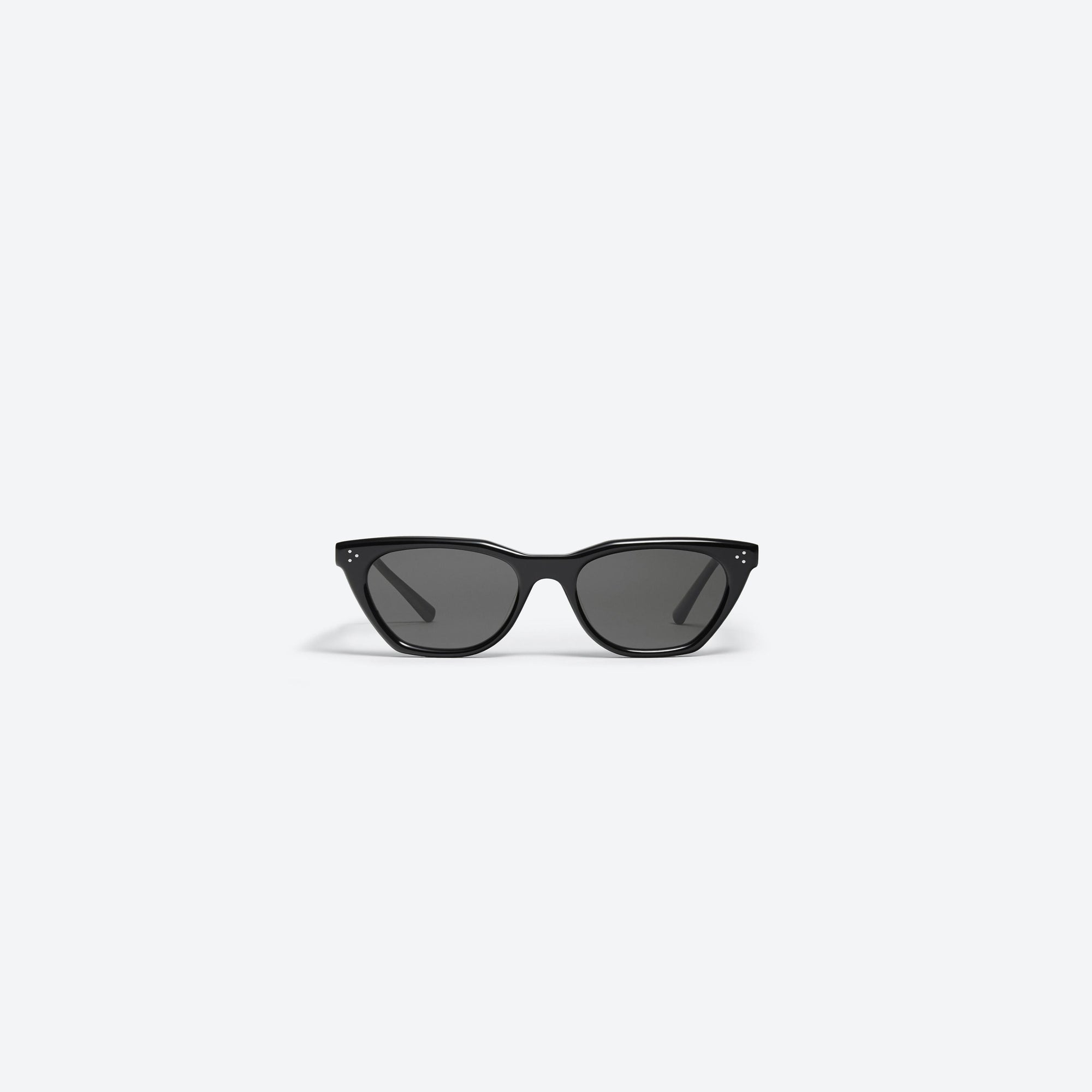 A front view of Gentle Monster Cookie 01 Black Acetate framed Cat-eye sunglasses.