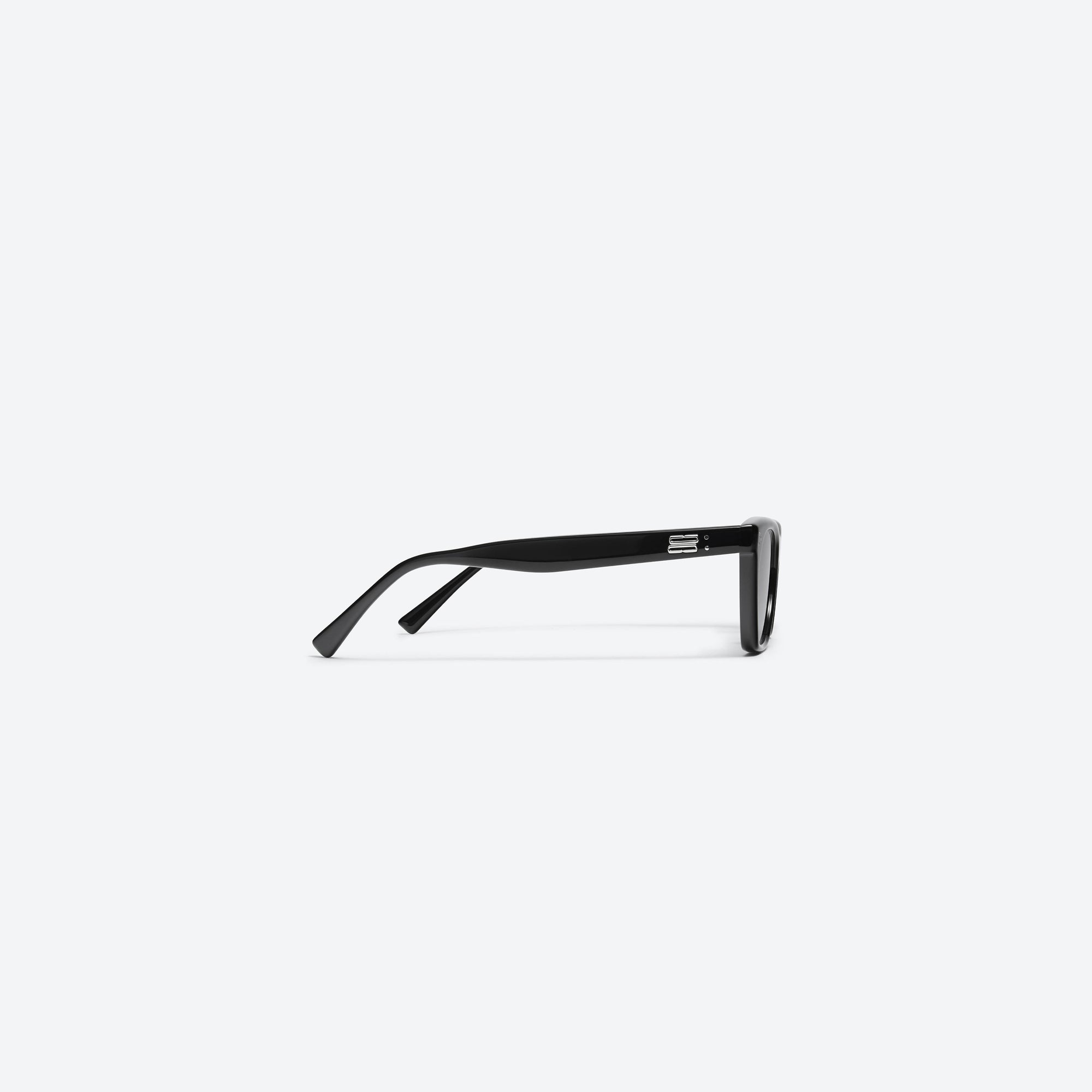 A detailed right view of Gentle Monster Cookie 01 Black Acetate framed Cat-eye sunglasses.