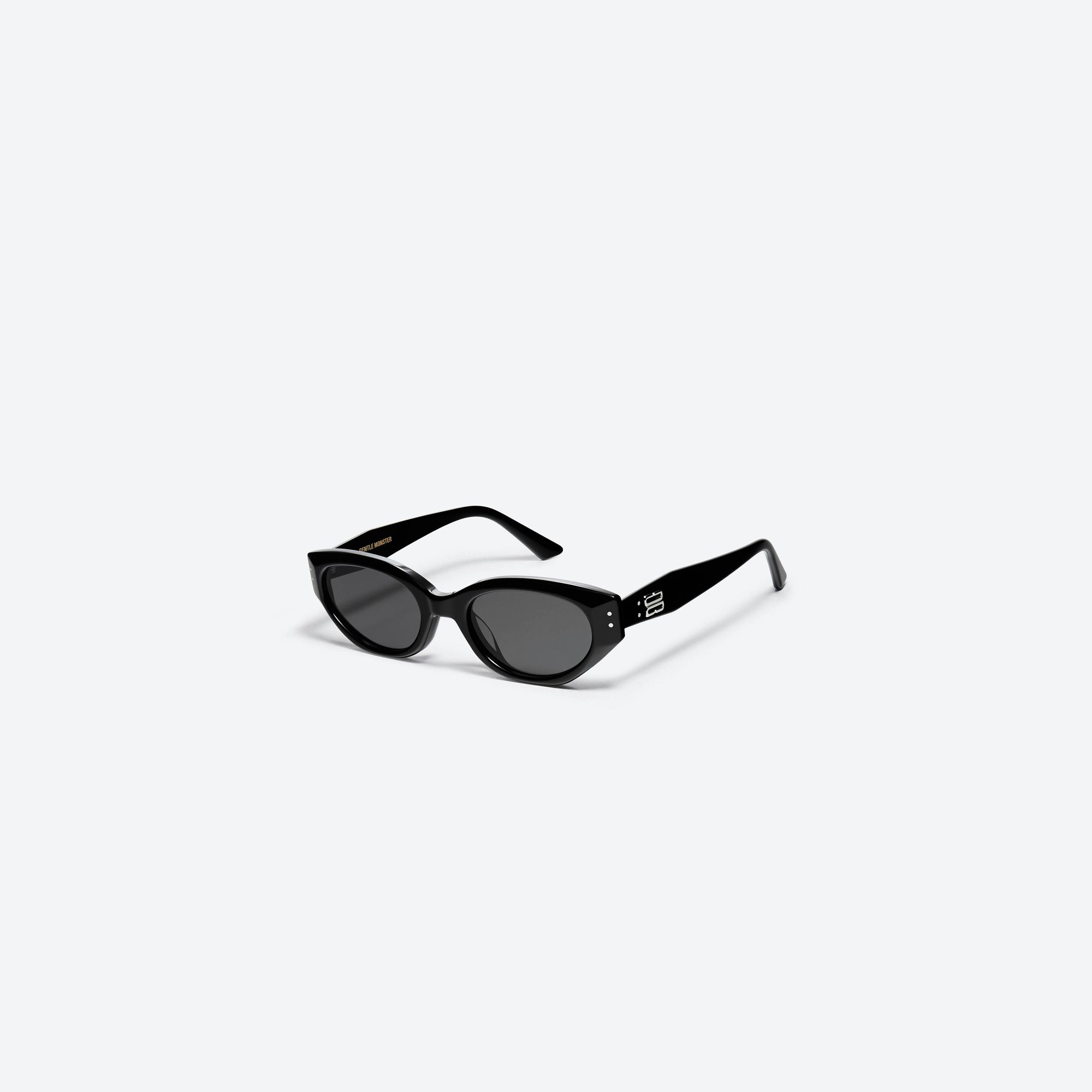 45-degree view of Gentle Monster Rococo 01 Black Acetate framed Cat-eye sunglasses.
