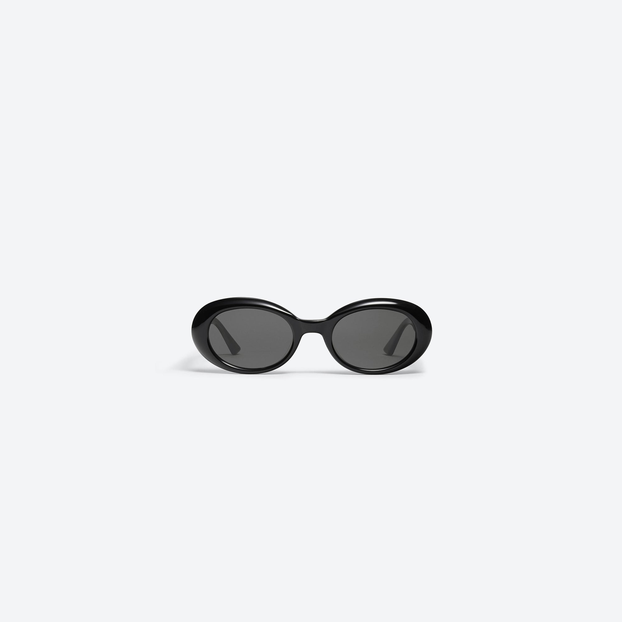 A front view of Gentle Monster La Mode 01 Black Acetate framed Oval sunglasses.