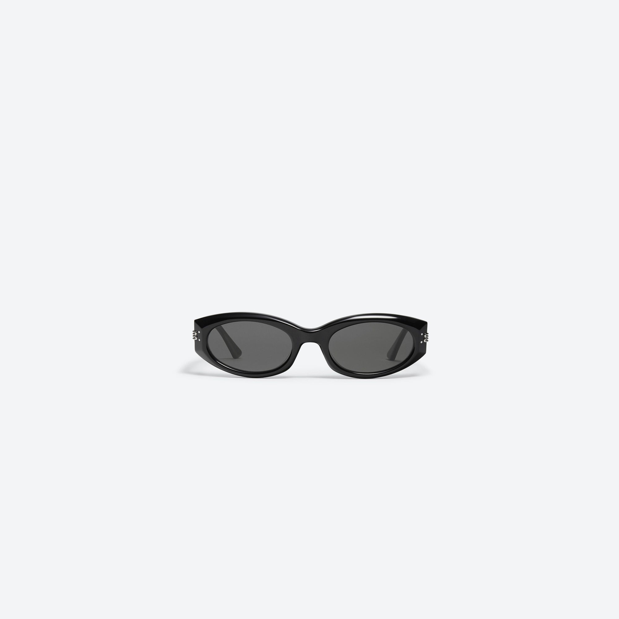 A front view of Gentle Monster Mass 01 Black Acetate framed Oval sunglasses.