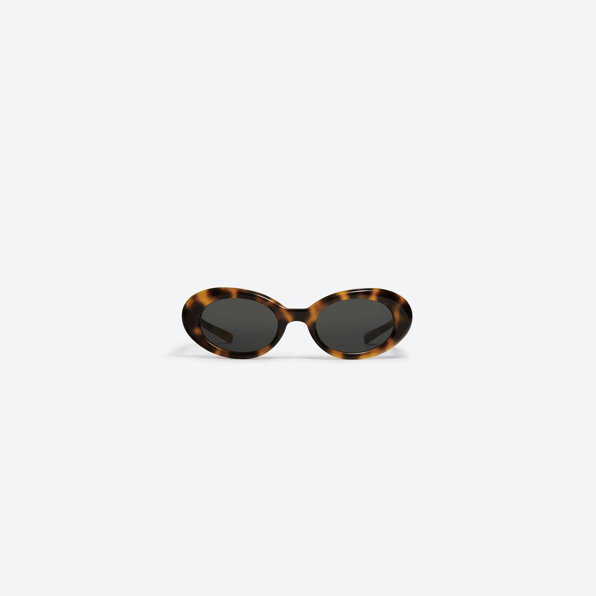 A front view of Gentle Monster Maison Margiela - MM005 L2 Tortoise Acetate framed Oval sunglasses.