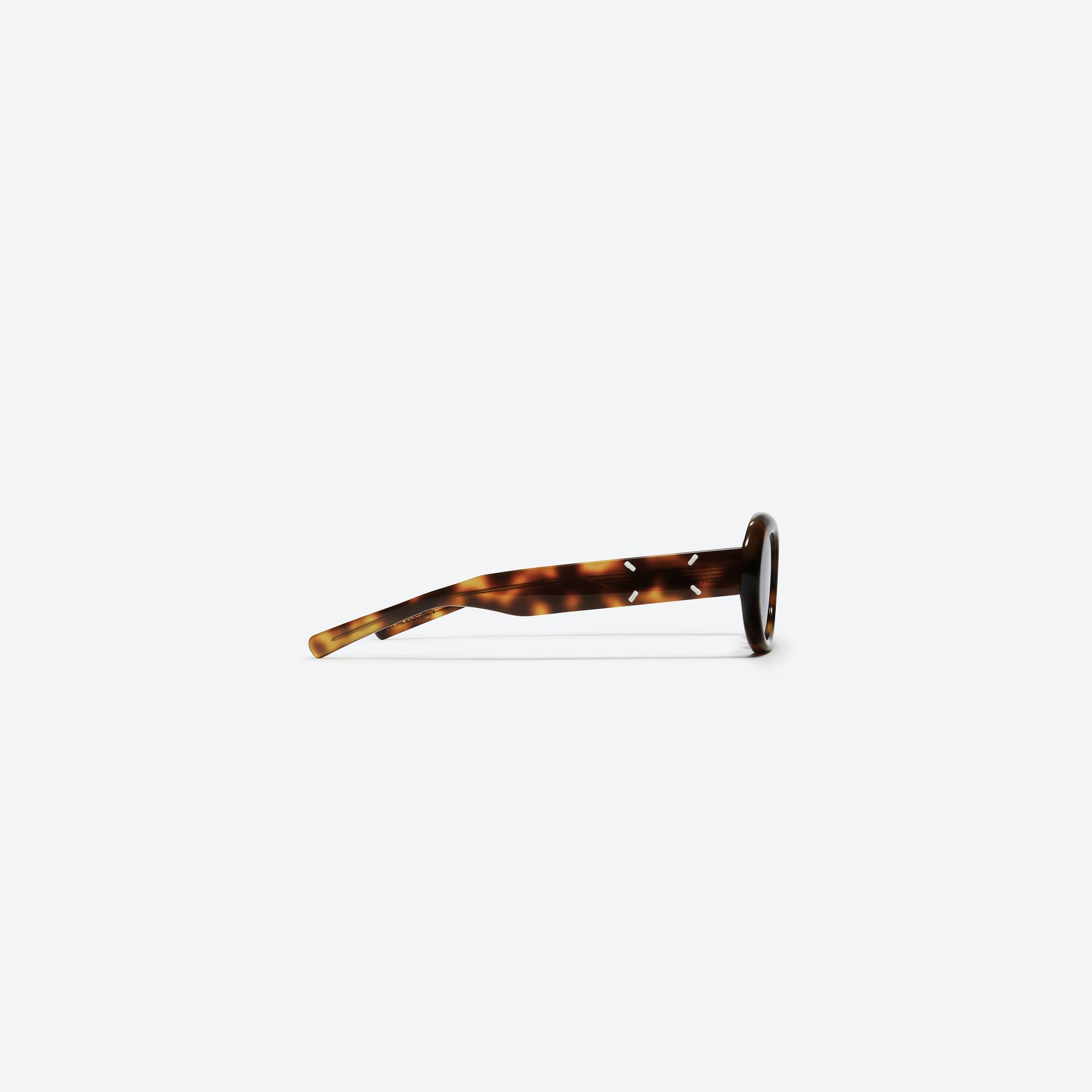 A detailed right view of Gentle Monster Maison Margiela - MM005 L2 Tortoise Acetate framed Oval sunglasses.