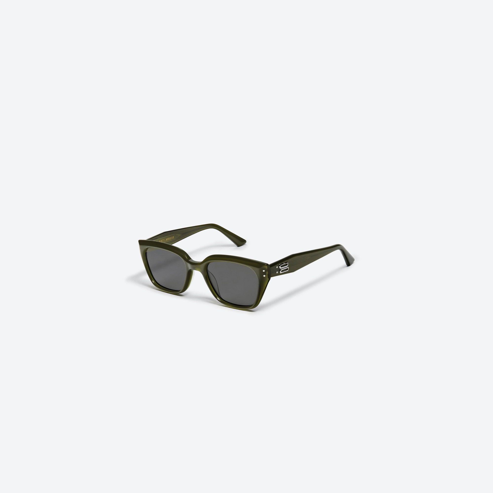 45-degree view of Gentle Monster Nada KC2 Green Acetate framed Square sunglasses.