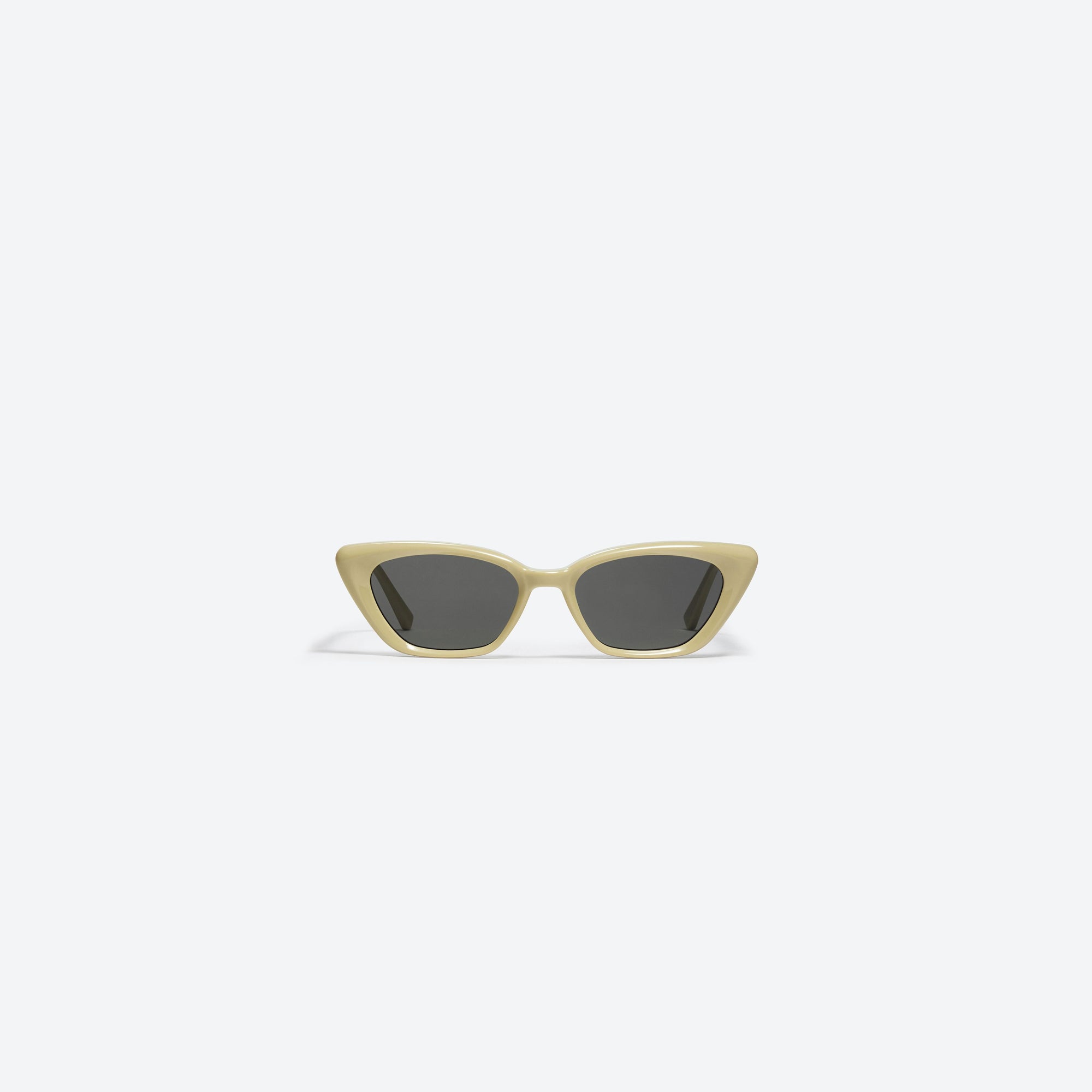 A front view of Gentle Monster Terra Cotta Y6 Yellow Acetate framed Cat-eye sunglasses.