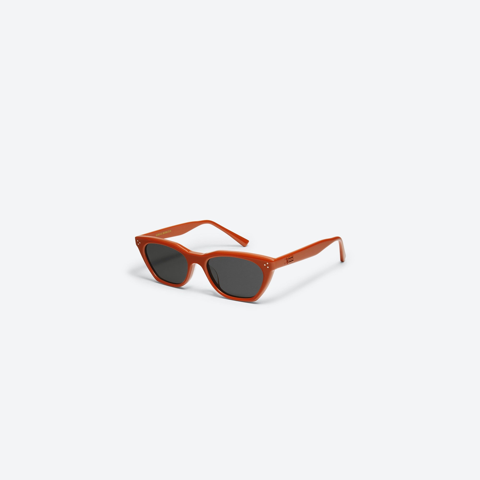 45-degree view of Gentle Monster Cookie OR2 Orange Acetate framed Cat-eye sunglasses.