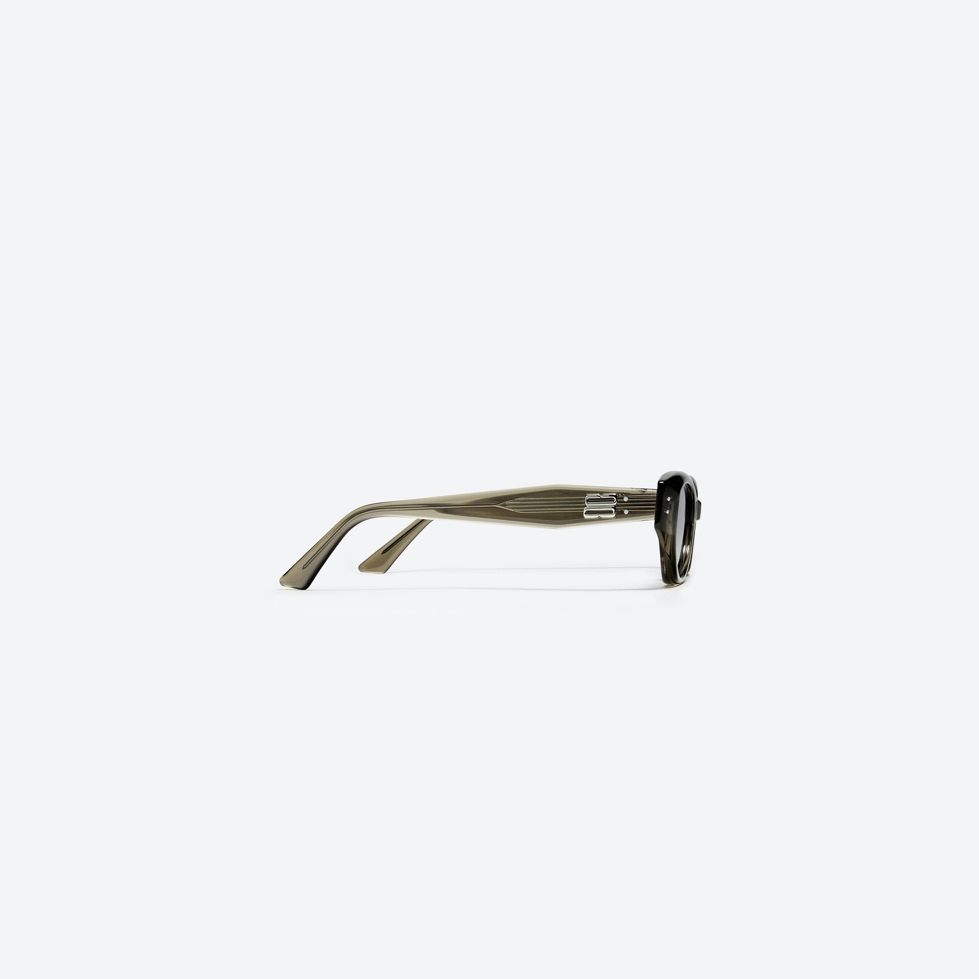 A detailed right view of Gentle Monster Rococo KC6 Green Acetate framed Cat-eye sunglasses.